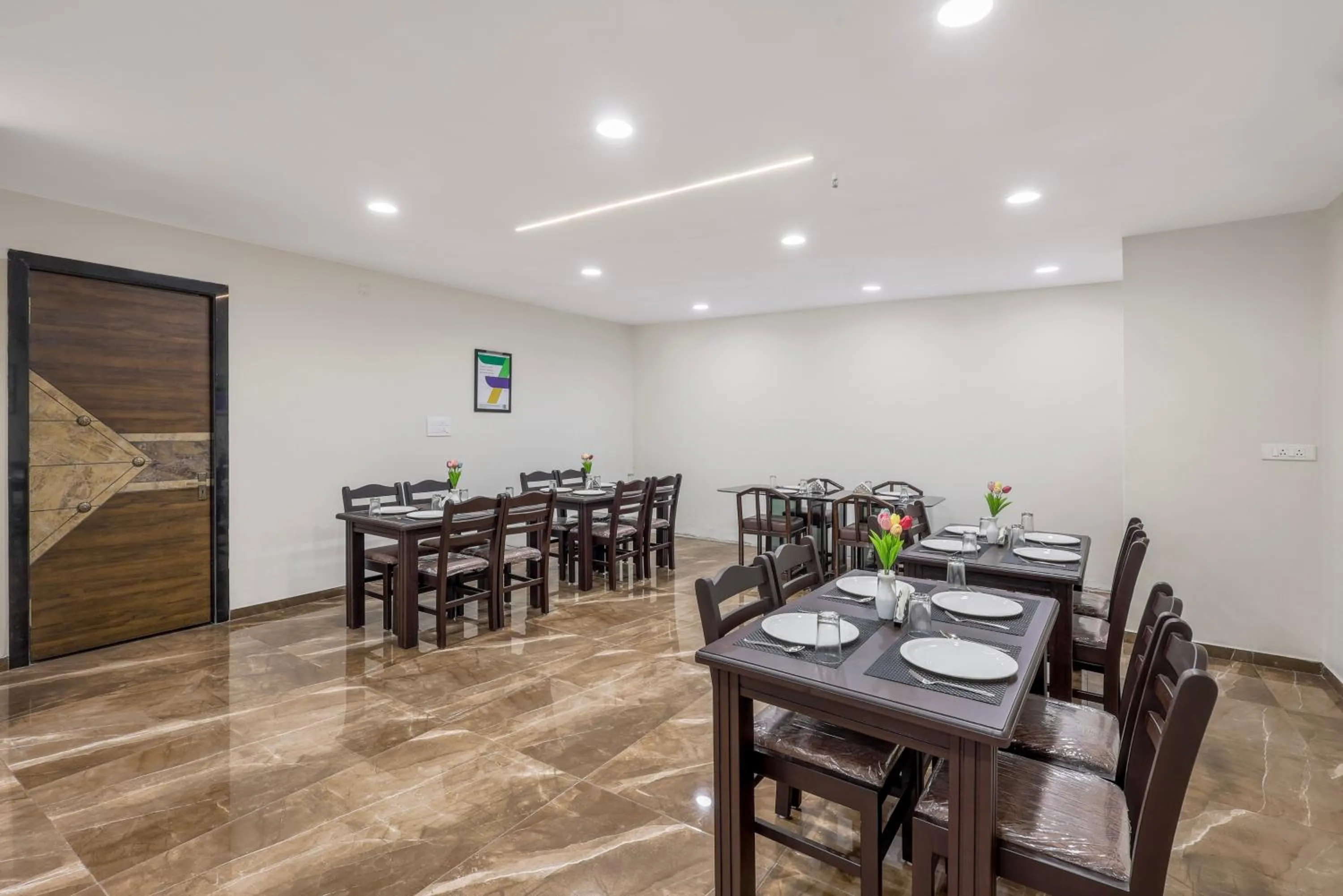 Dining area in Treebo Iraa, 5 Minutes From Railway Station