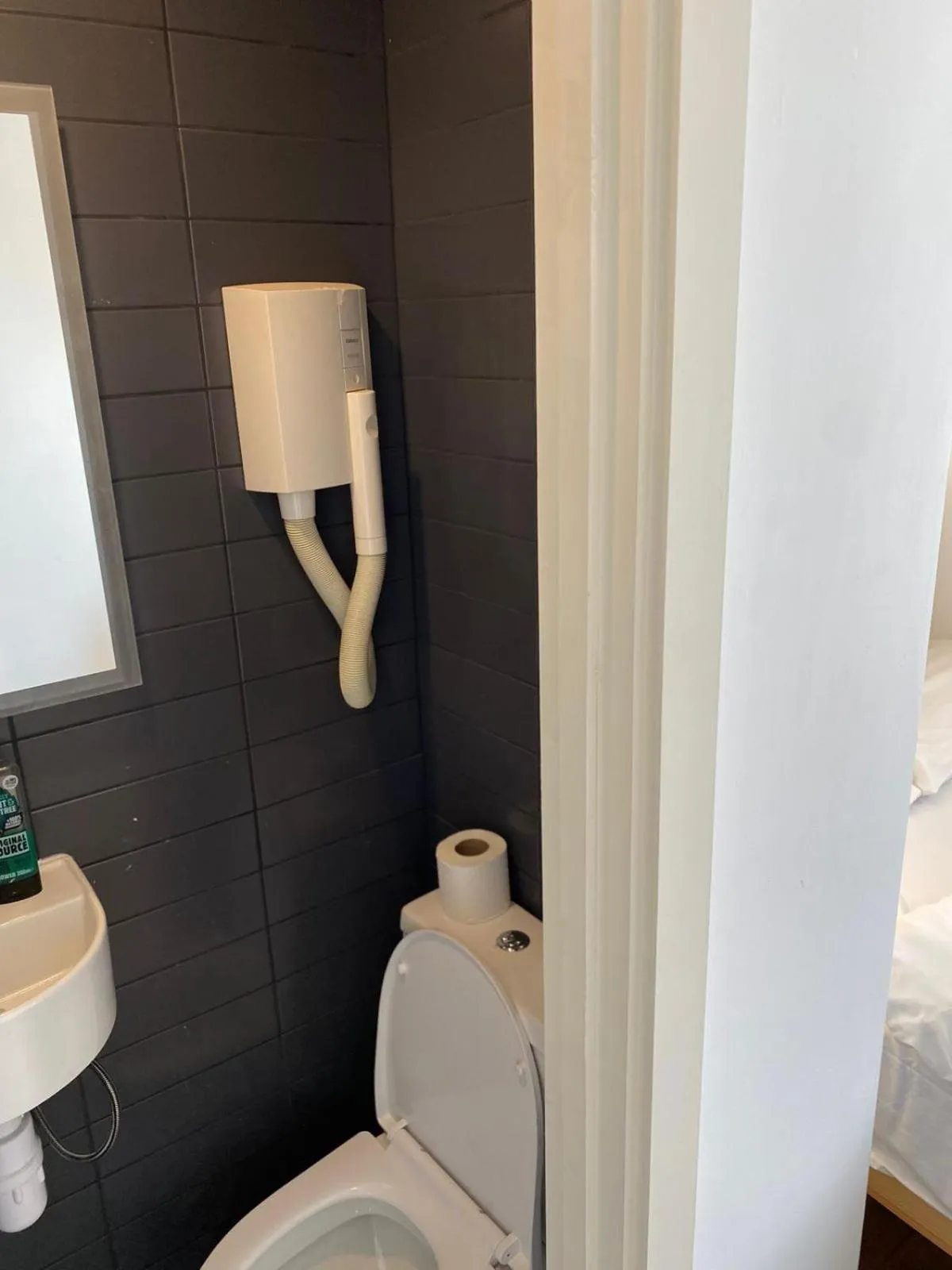 Bathroom in Exhibition Court Hotel 4