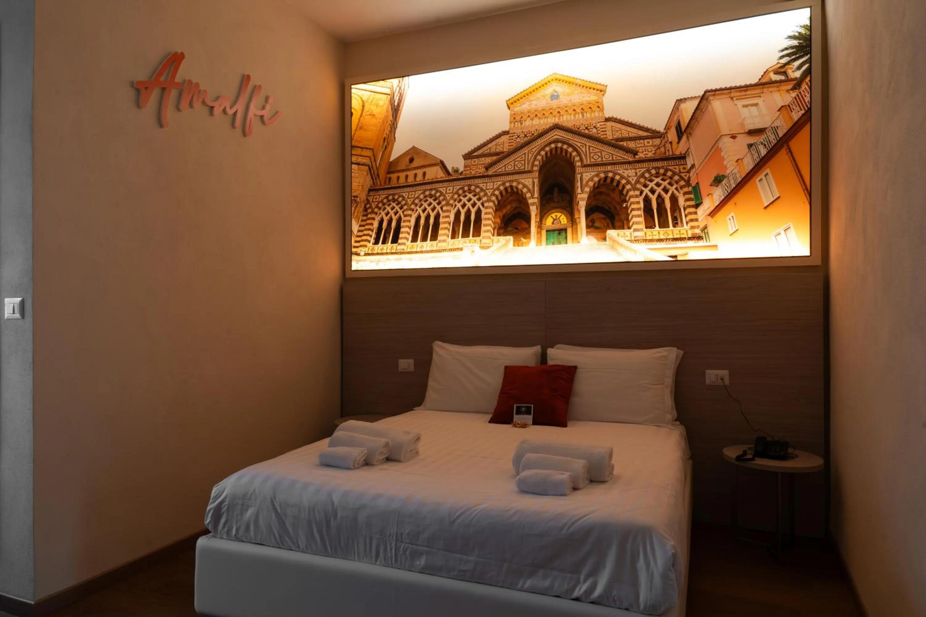 Bed in THE SUN HOTEL BOUTIQUE NAPOLI