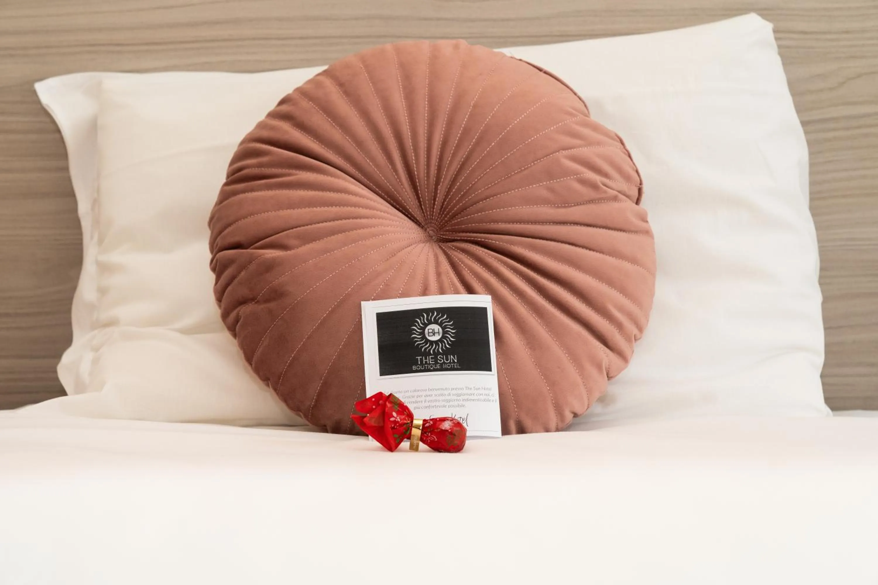 Bed in THE SUN HOTEL BOUTIQUE NAPOLI