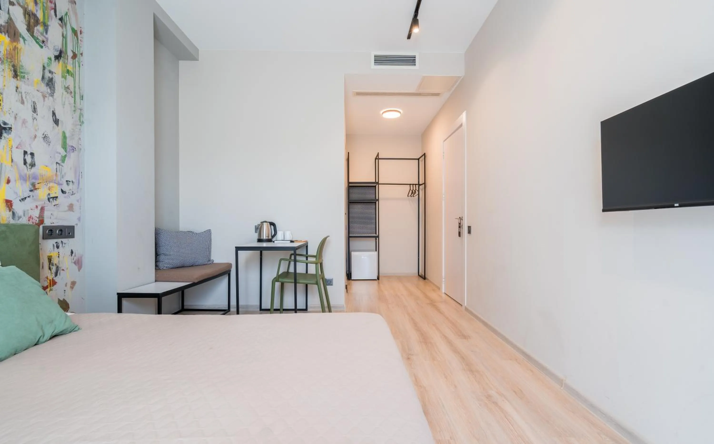 Communal lounge/ TV room, Bed in Doors Boutique Hotel