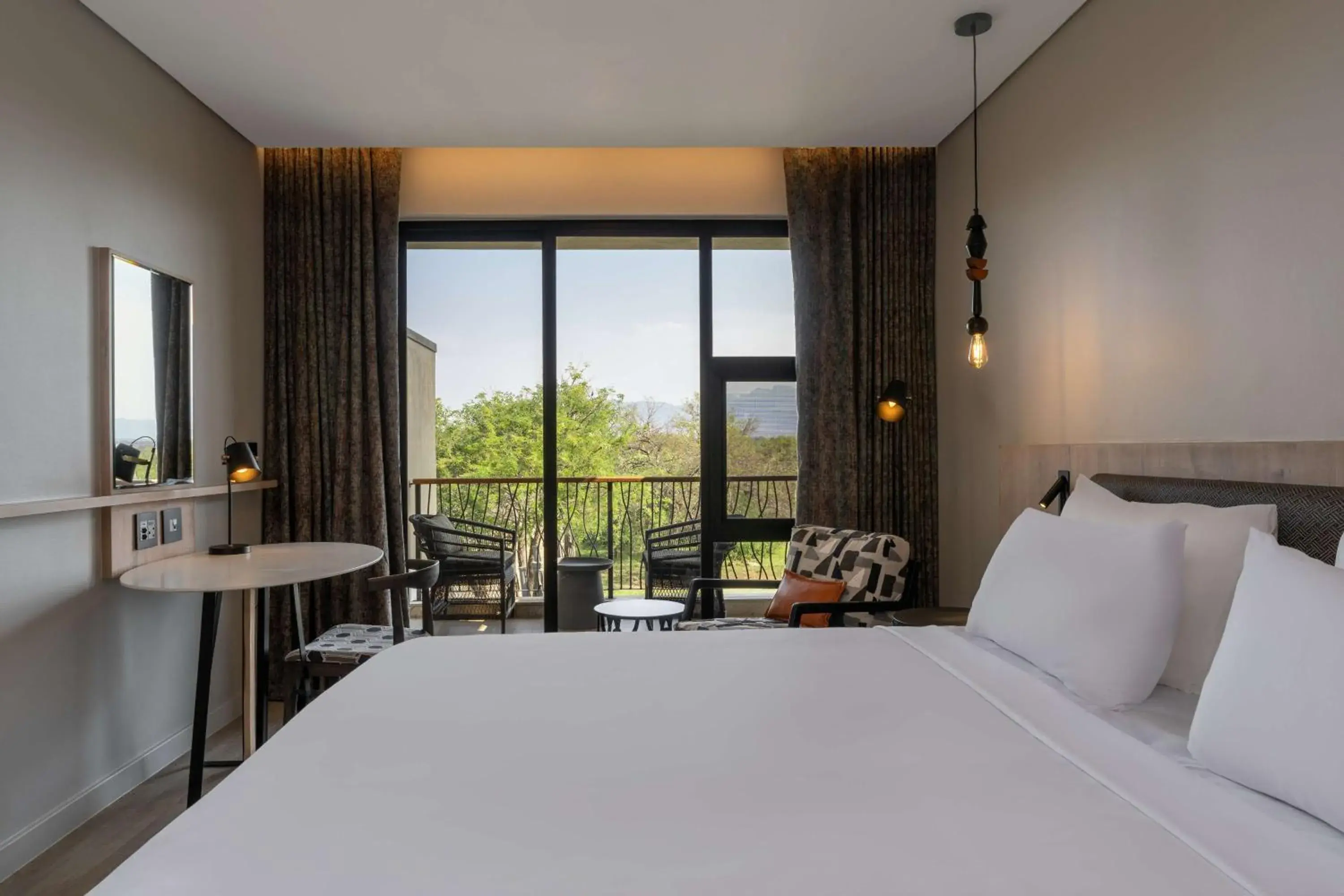 Bedroom, Bed in Radisson Safari Hotel Hoedspruit Bedroom, Bed in Radisson Safari Hotel Hoedspruit
