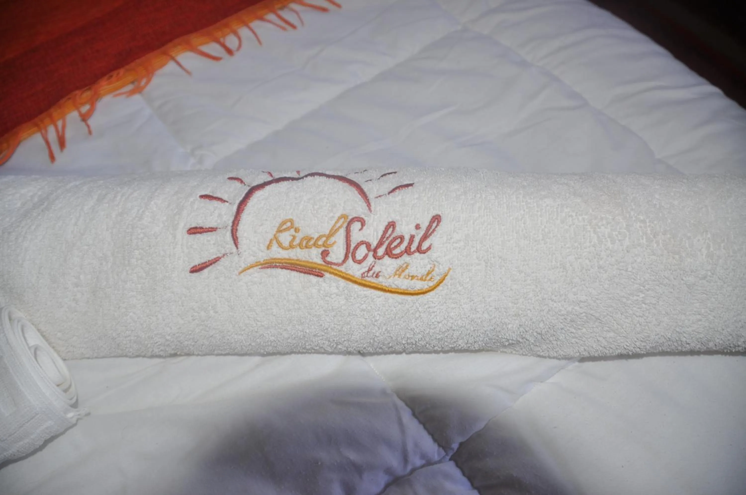 towels, Bed in Riad Soleil du Monde