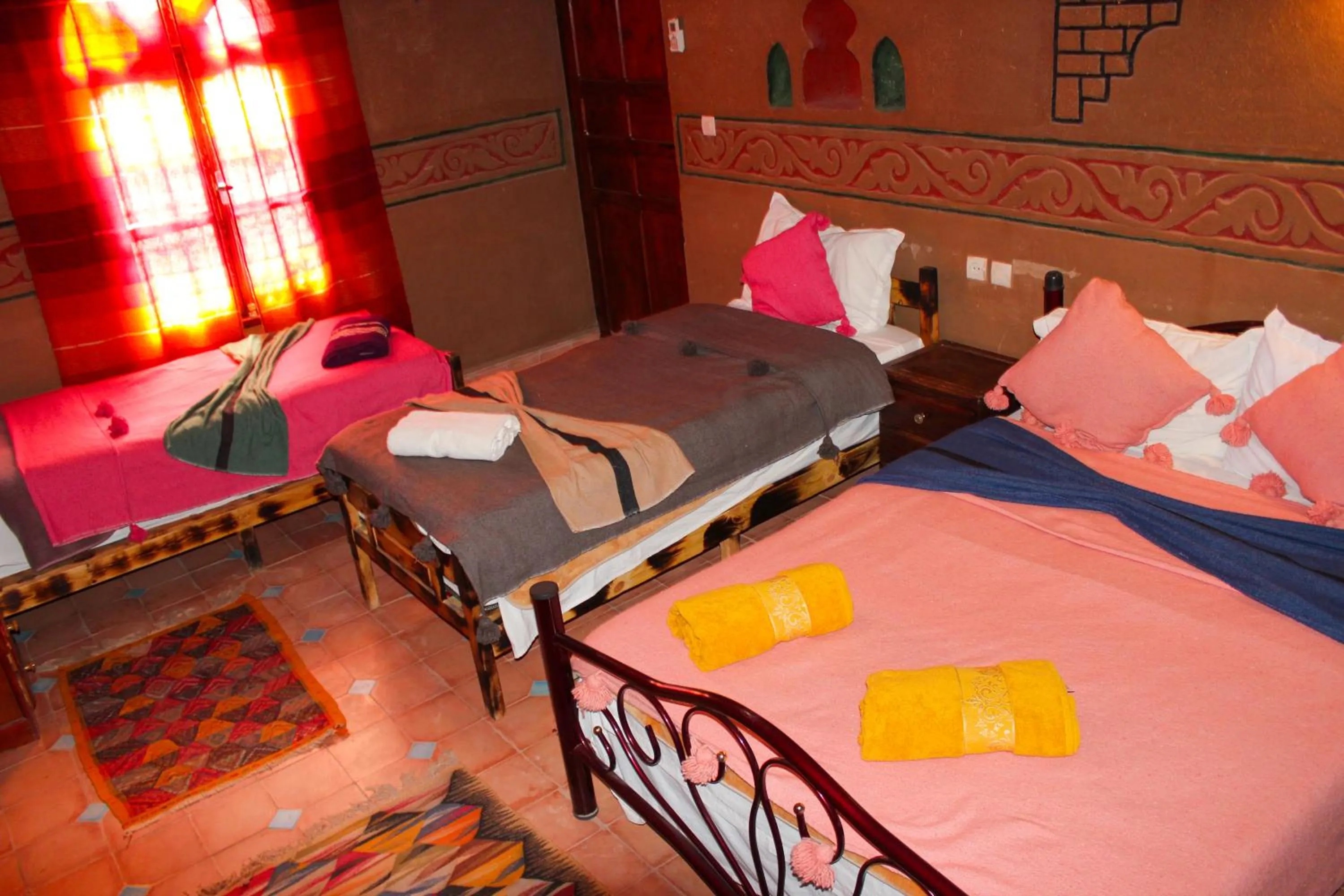 Bed in Riad Soleil du Monde