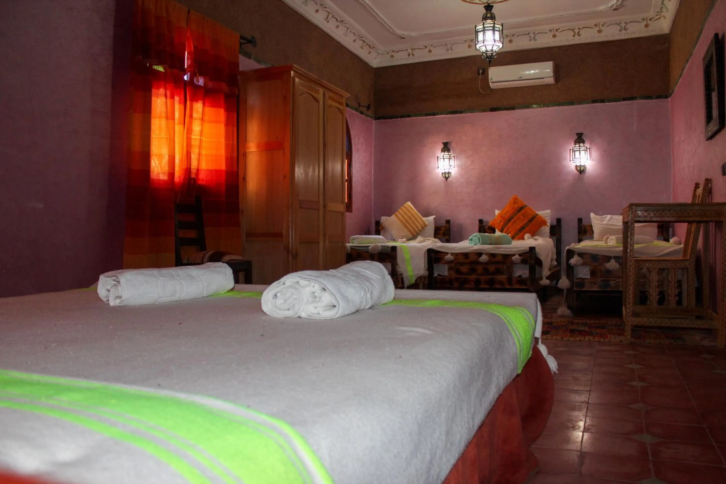 Bed in Riad Soleil du Monde