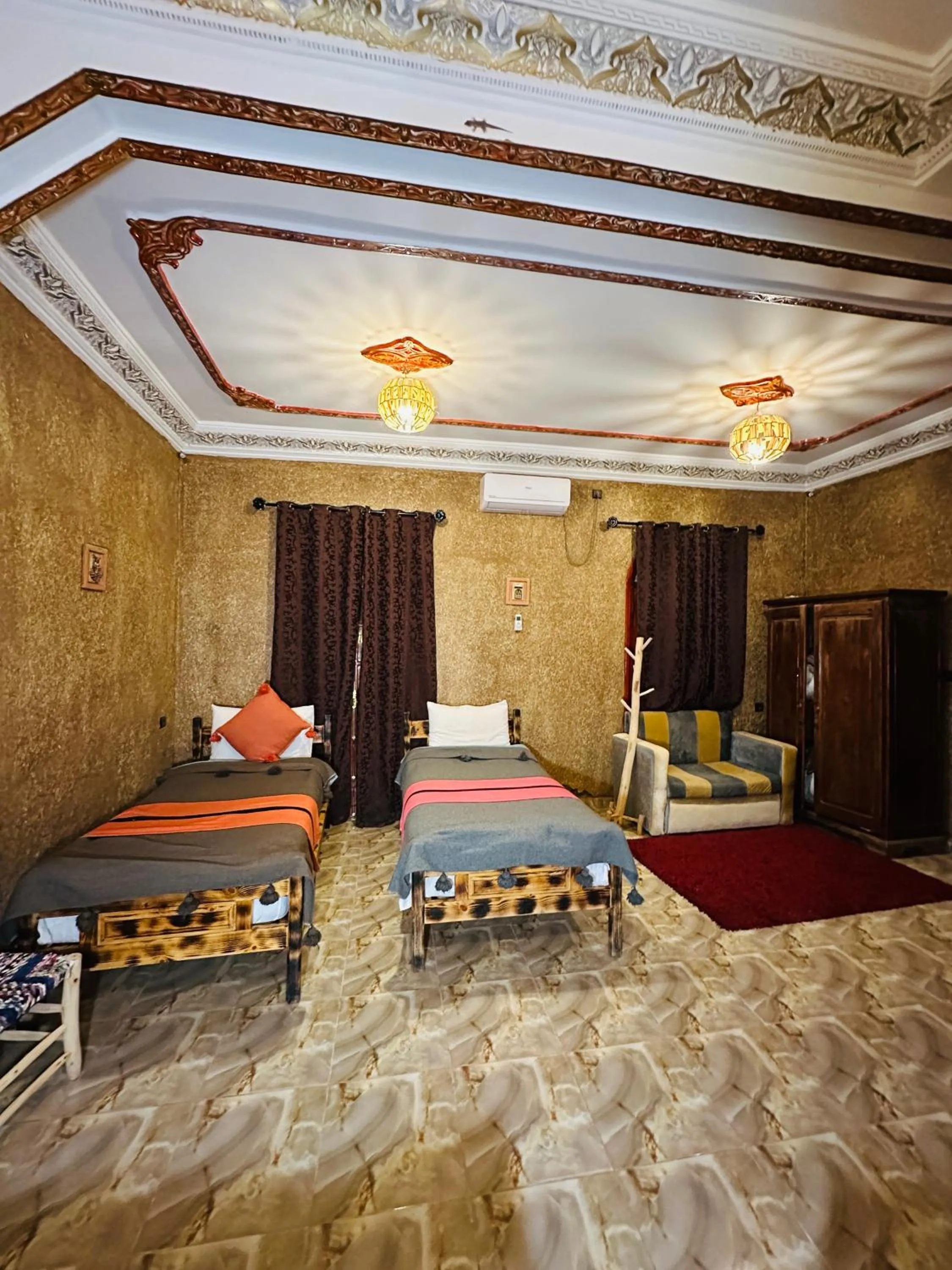 Bed in Riad Soleil du Monde