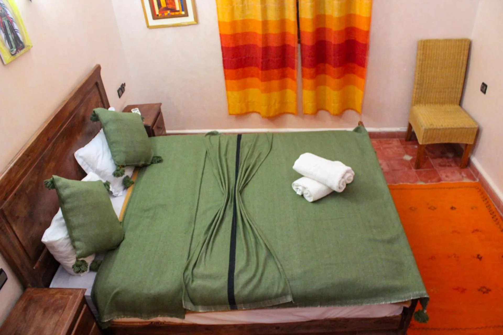 Bed in Riad Soleil du Monde