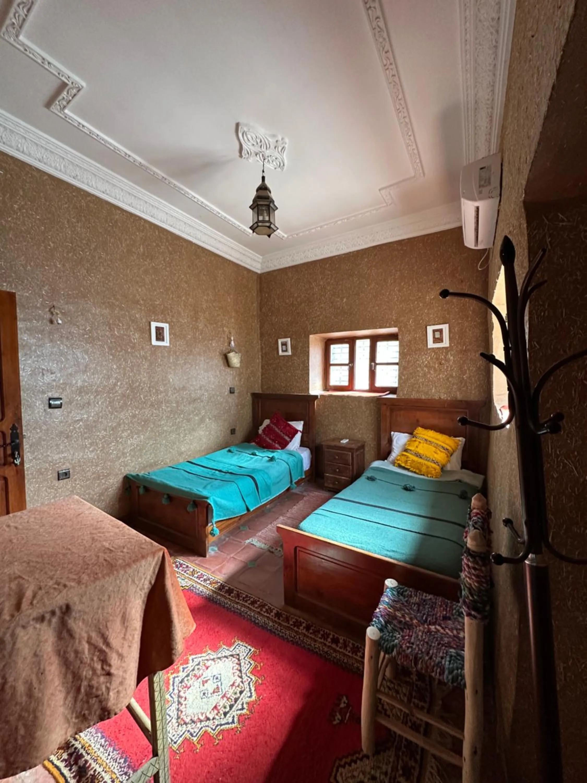 Bed in Riad Soleil du Monde