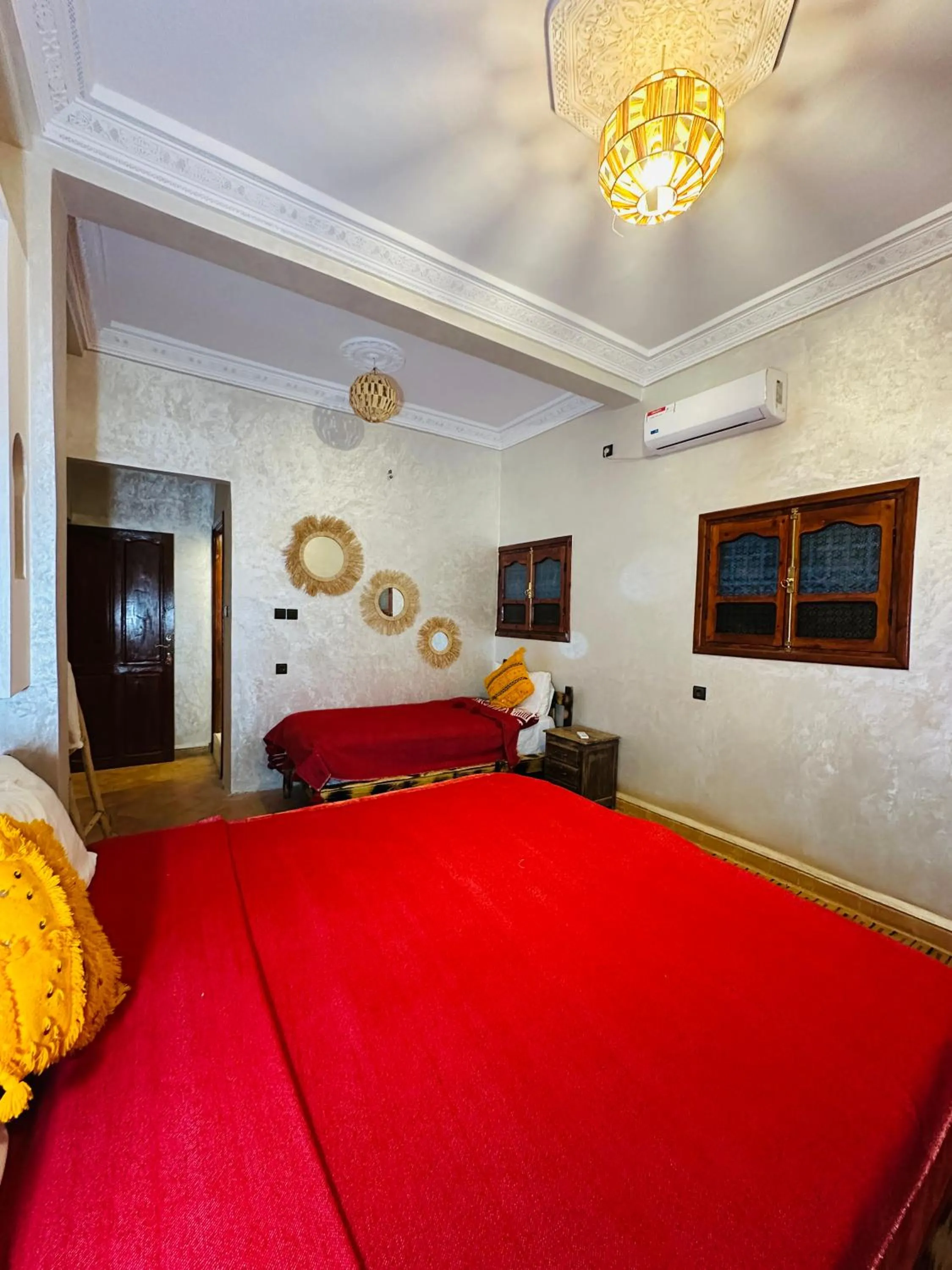 Bed in Riad Soleil du Monde