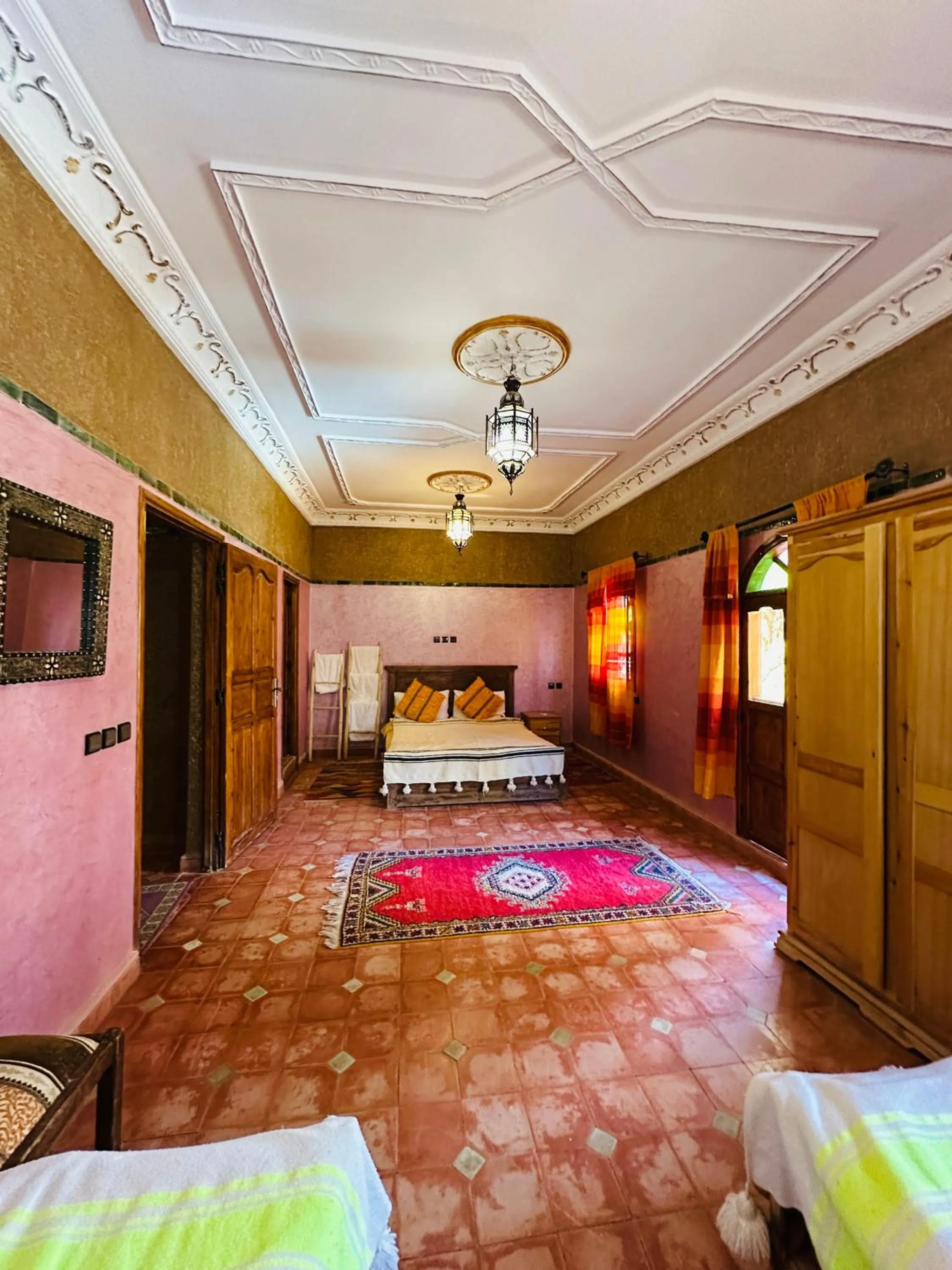 Bed in Riad Soleil du Monde