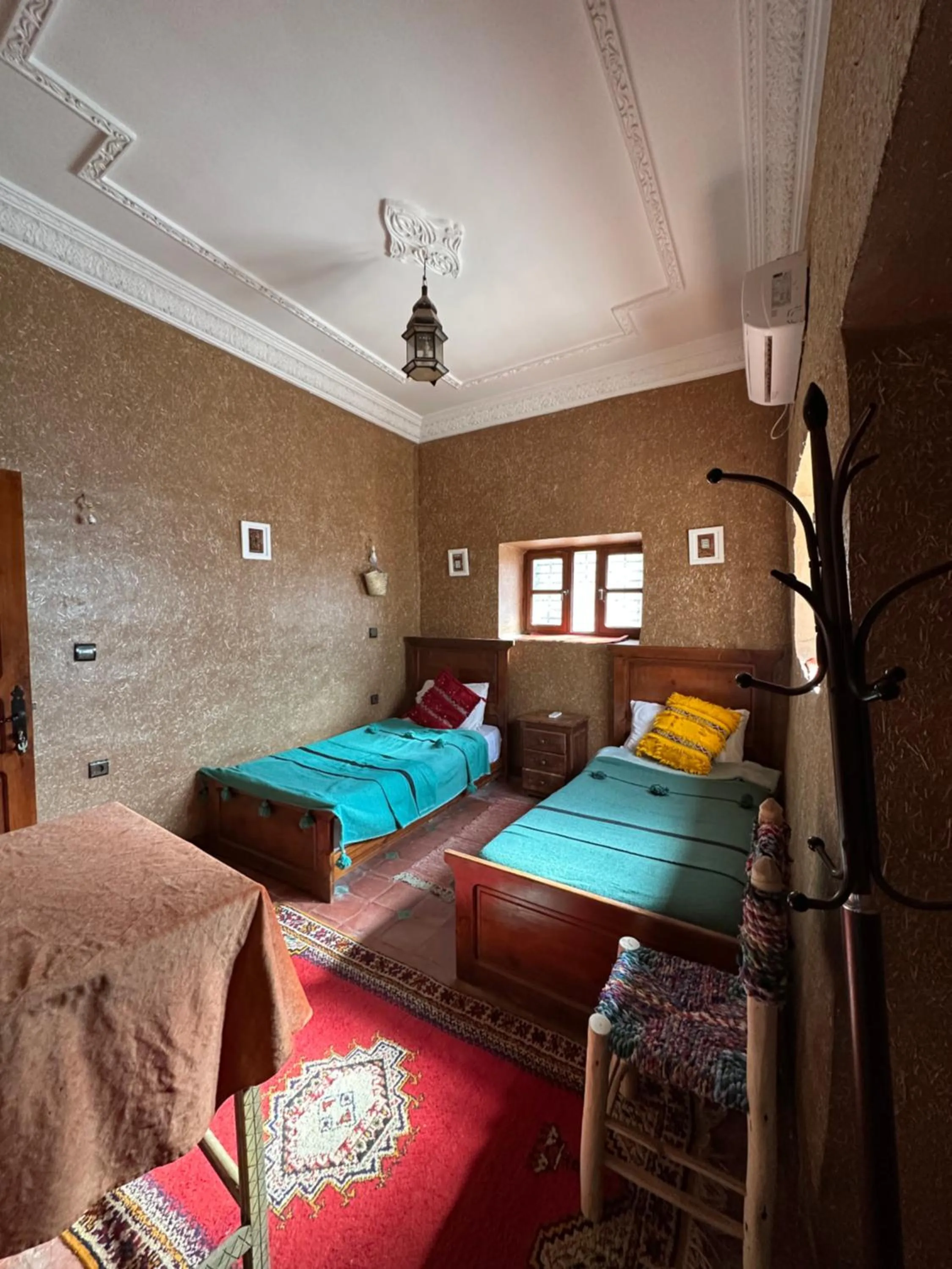 Bed in Riad Soleil du Monde