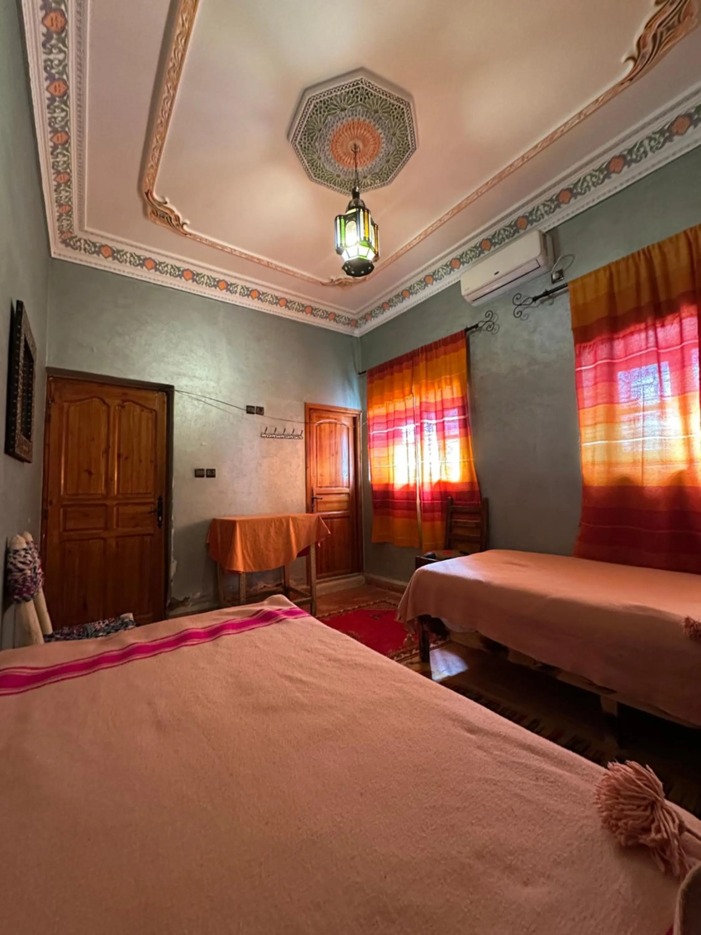 Bed in Riad Soleil du Monde