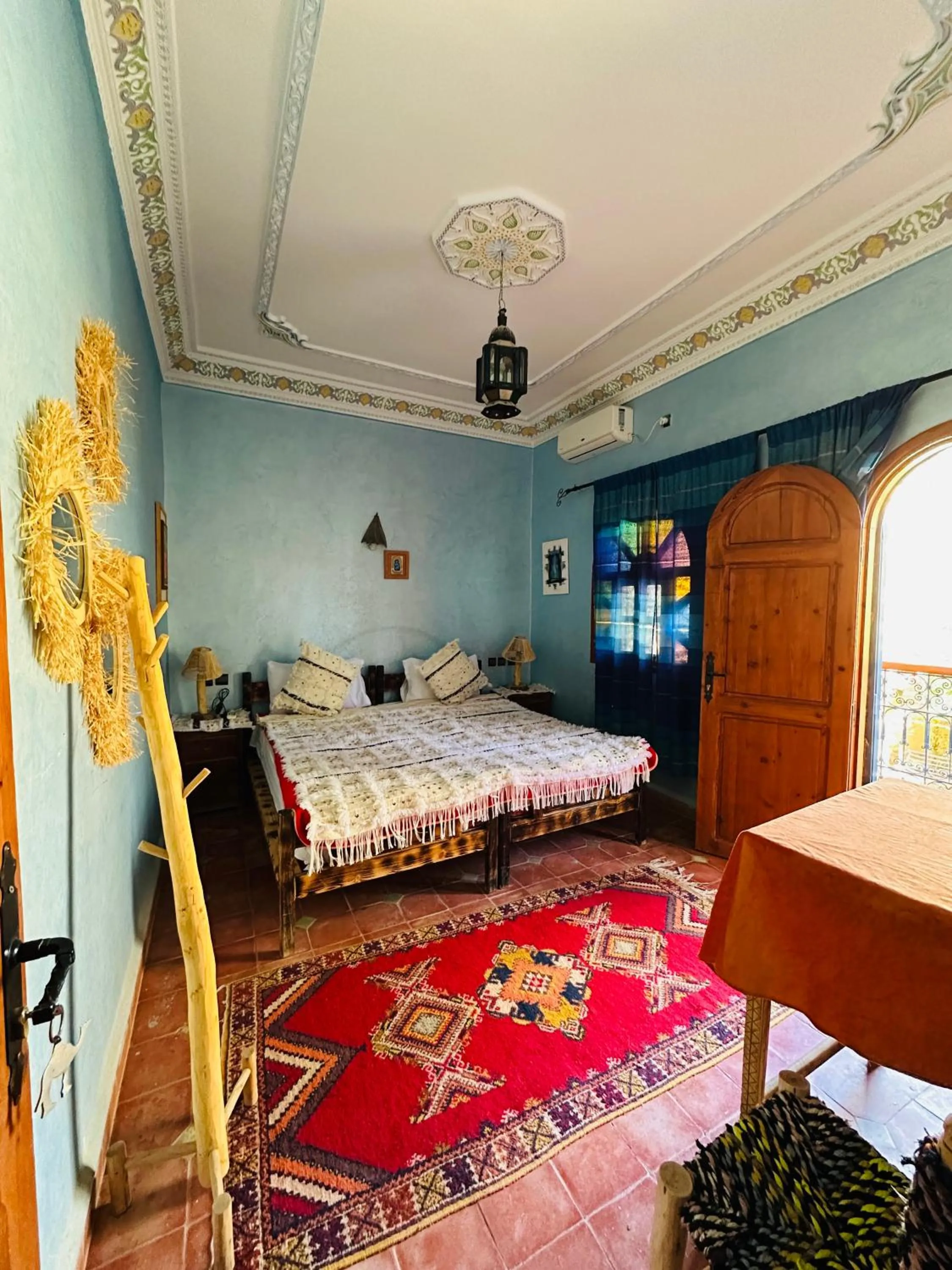 Bed in Riad Soleil du Monde