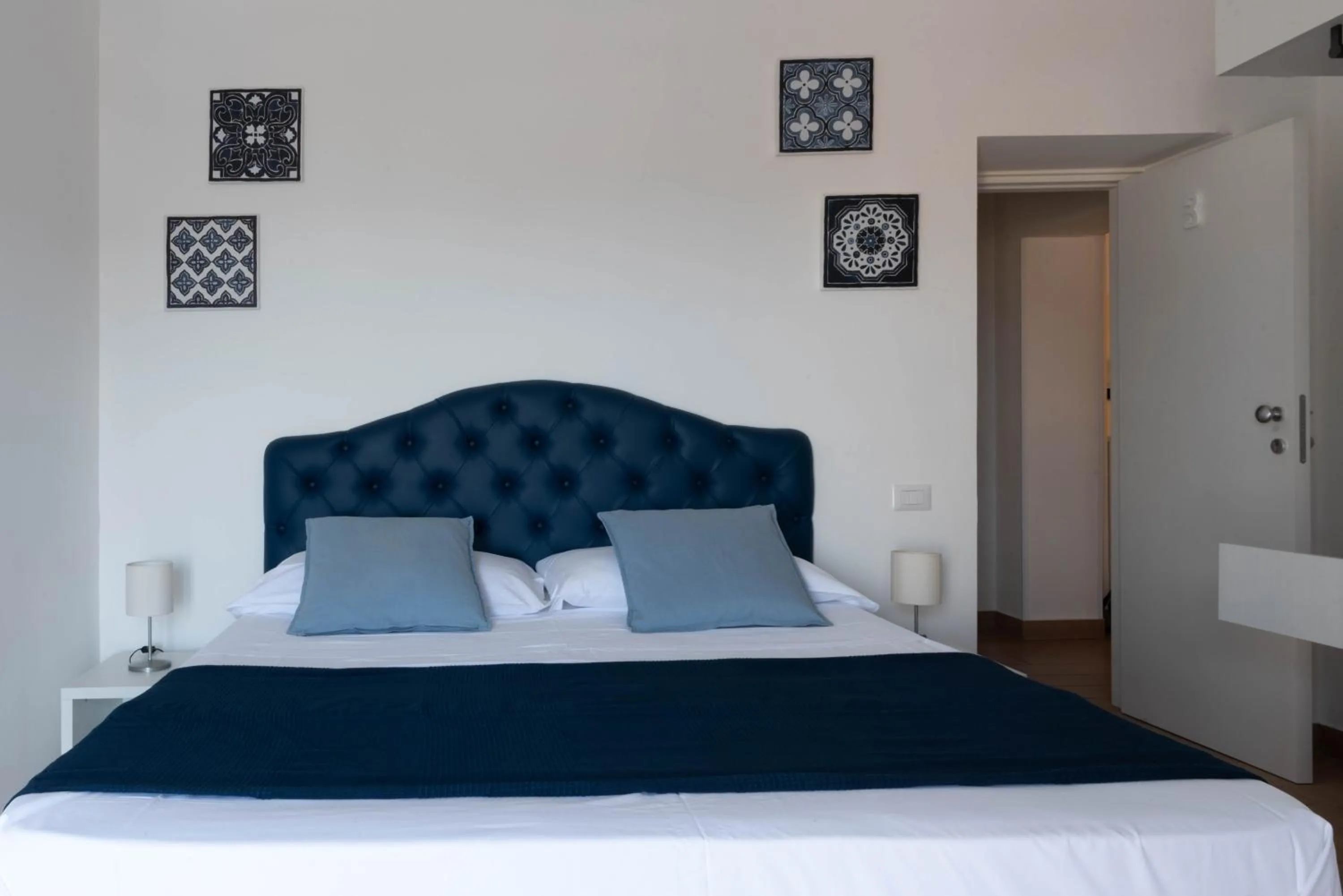 Bed in Sirentum Rooms