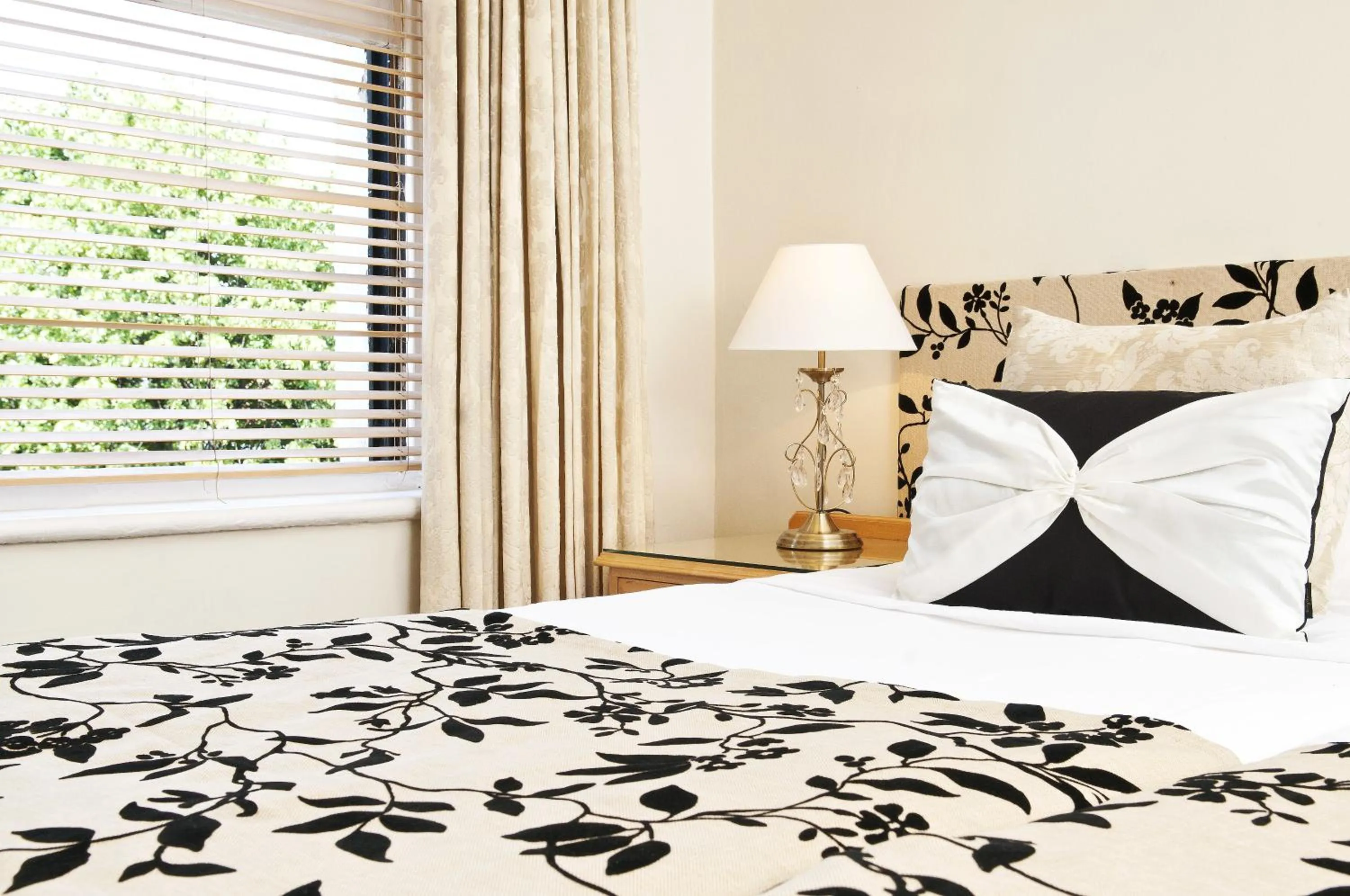 Bed in Rushmore Hotel