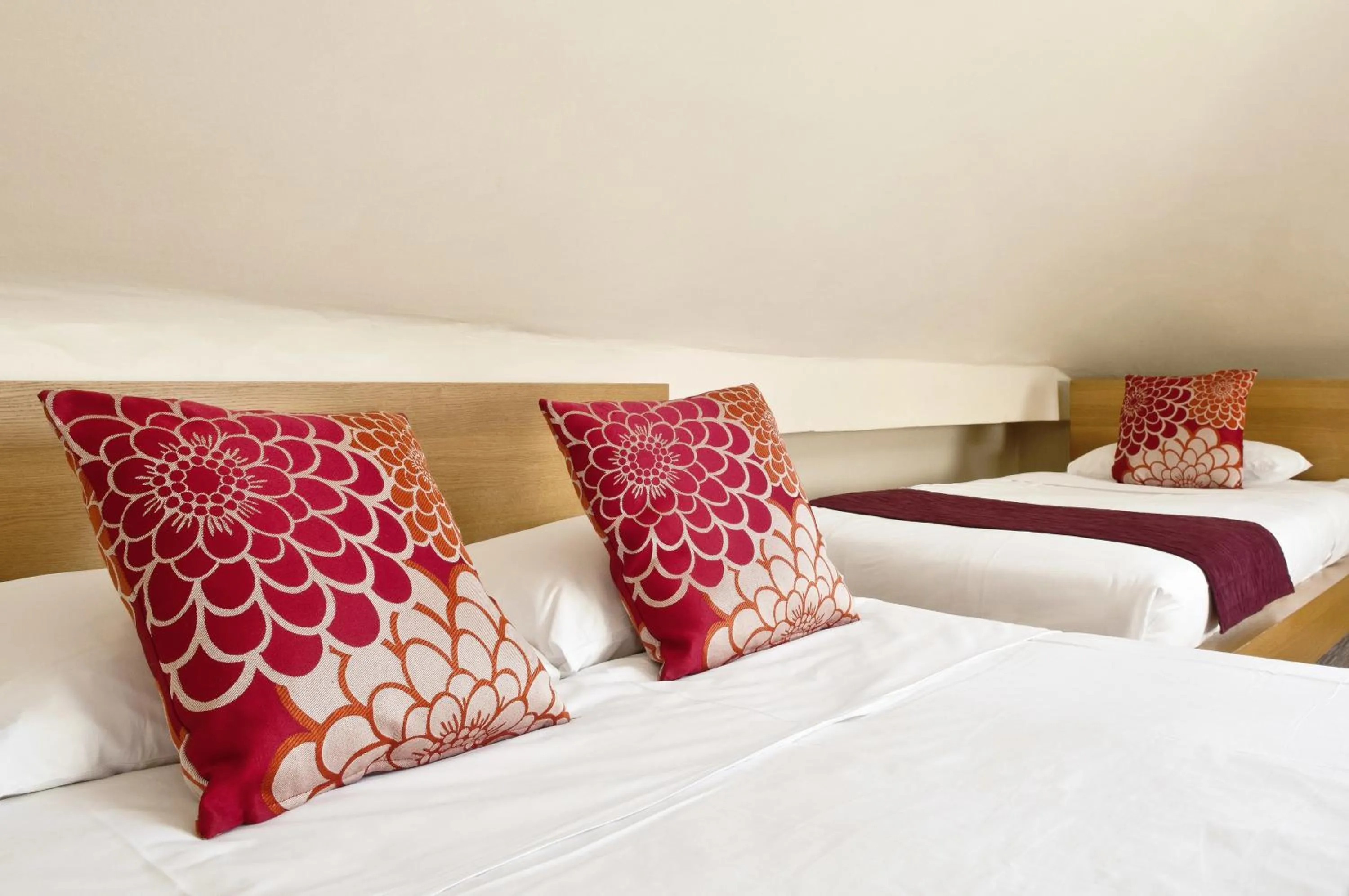 Bed in Rushmore Hotel