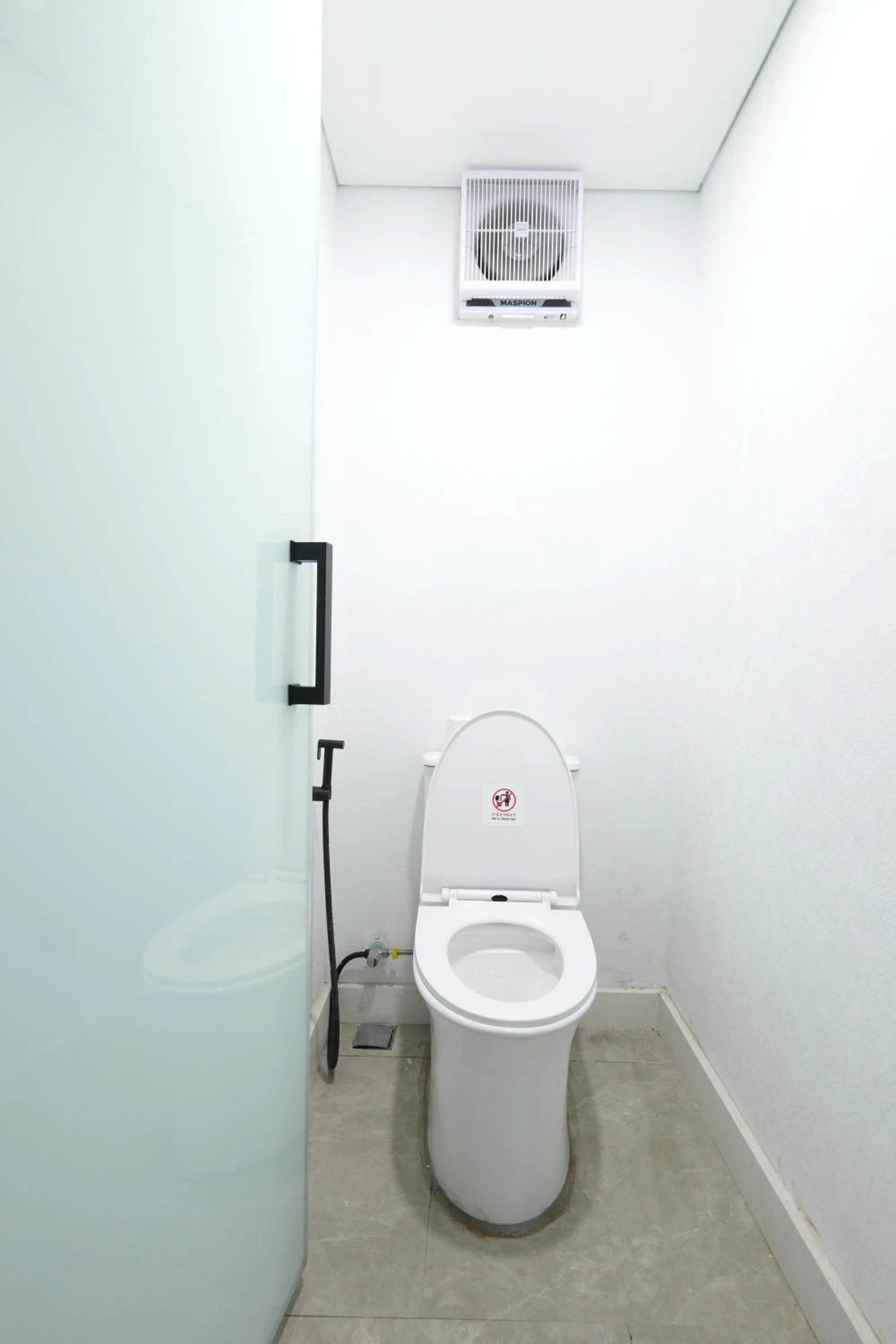 Toilet in Aster Apartment Bali
