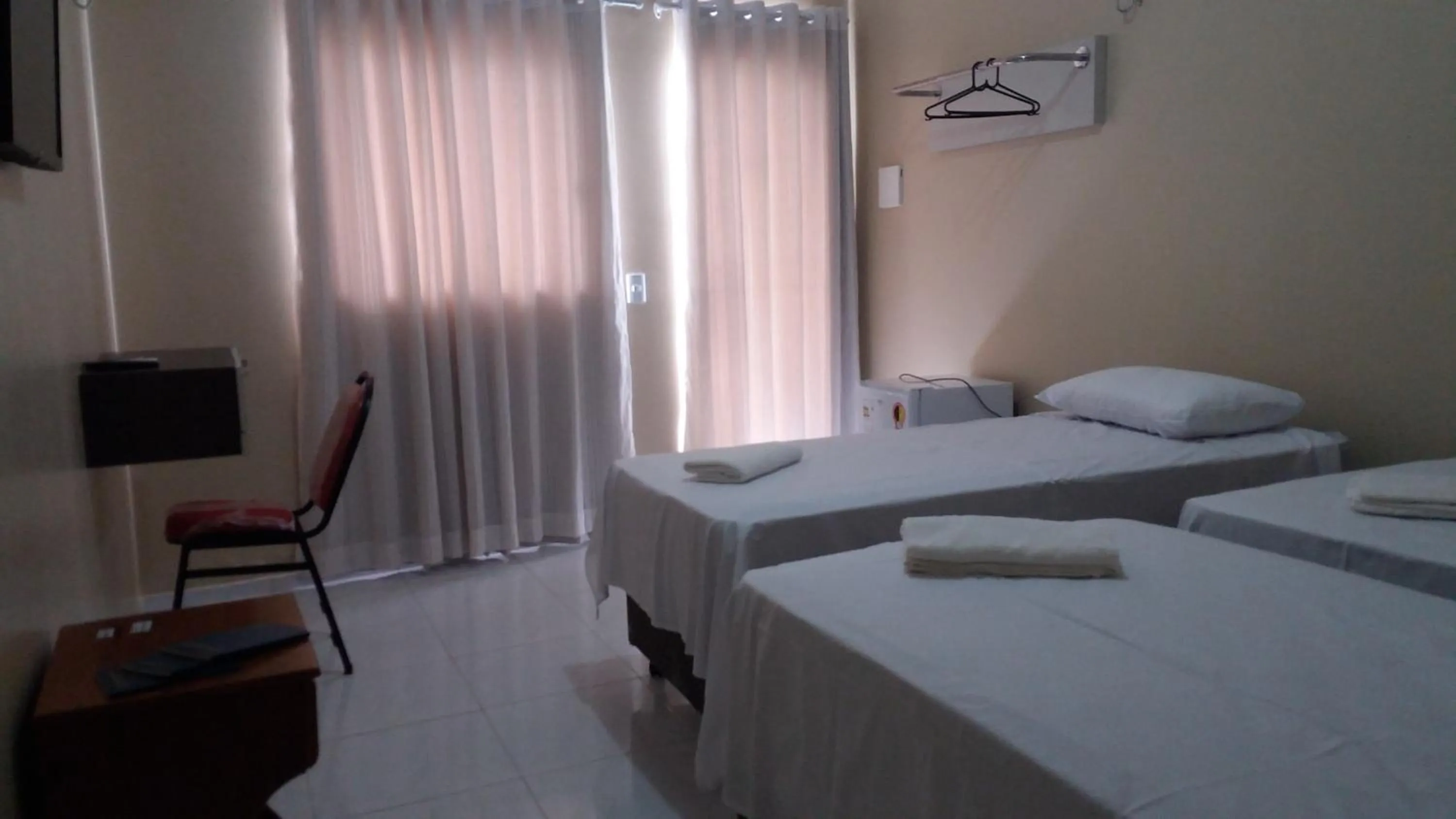 Bed in Hana Praia Hotel
