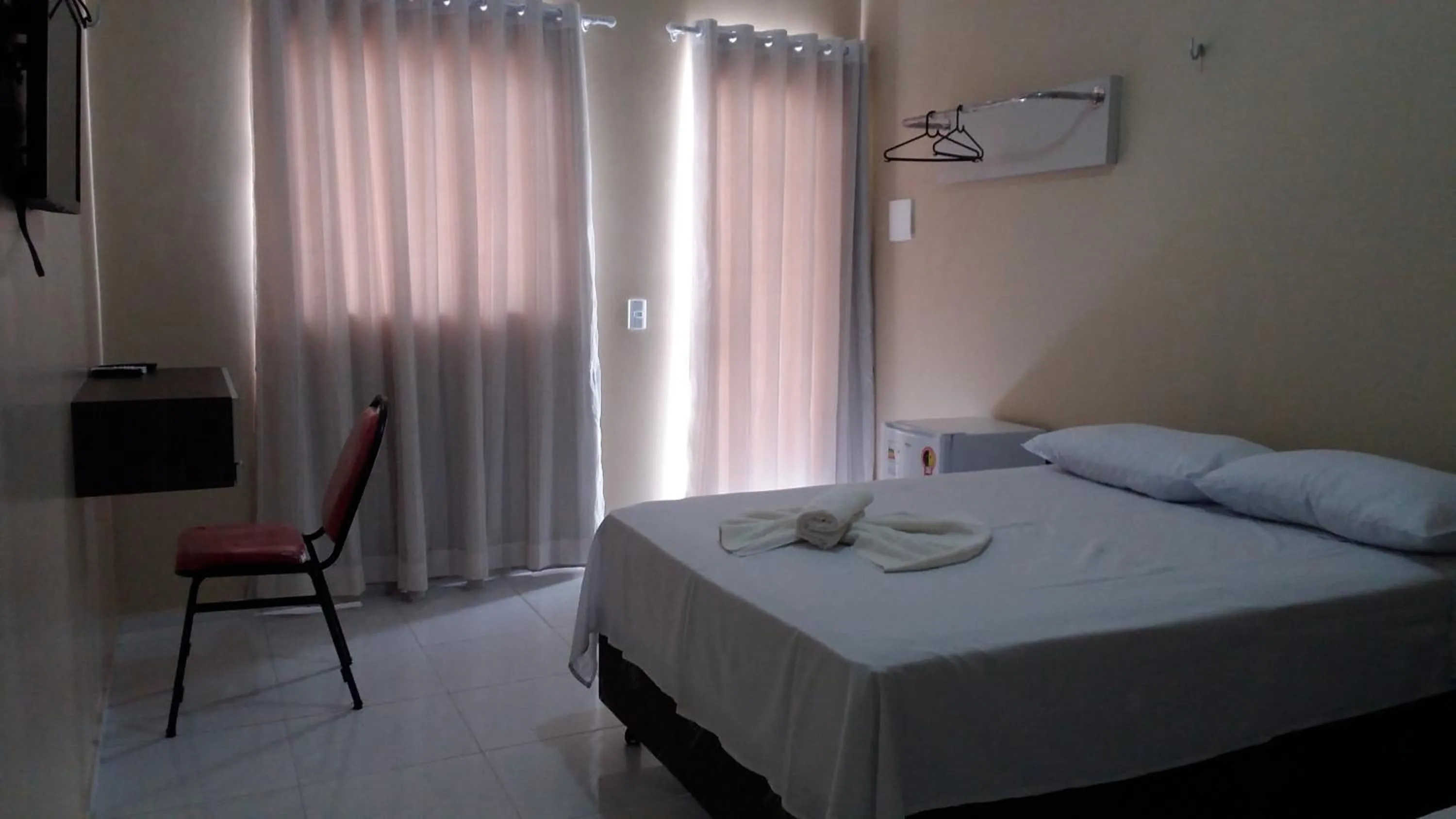 Bed in Hana Praia Hotel