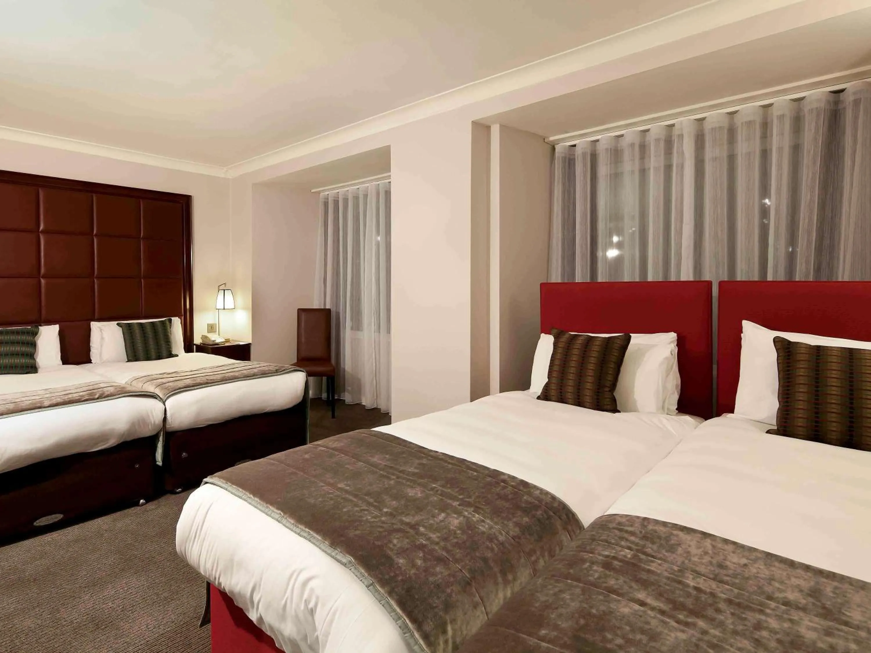 Photo of the whole room in Mercure London Kensington Hotel