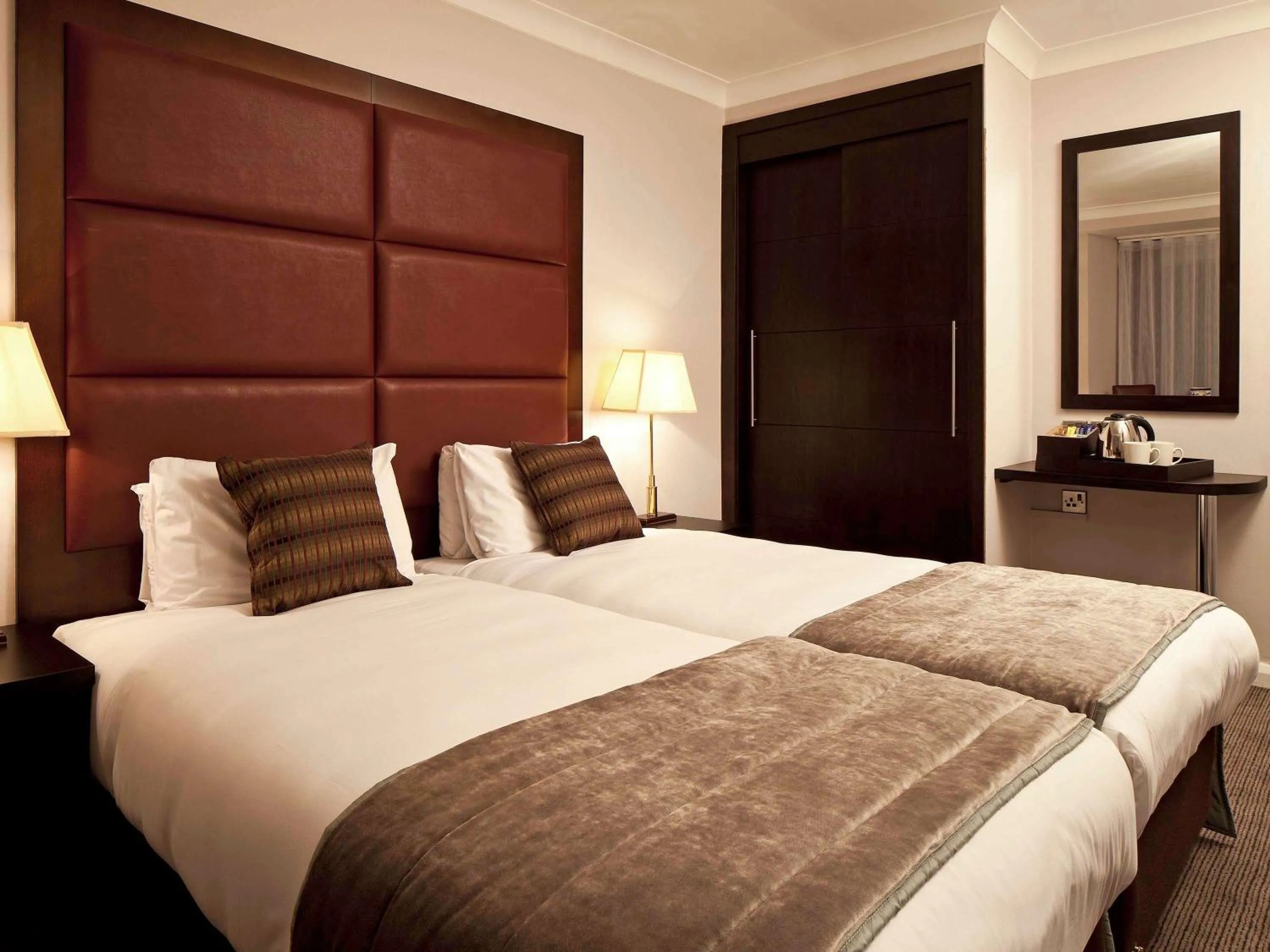 Photo of the whole room in Mercure London Kensington Hotel