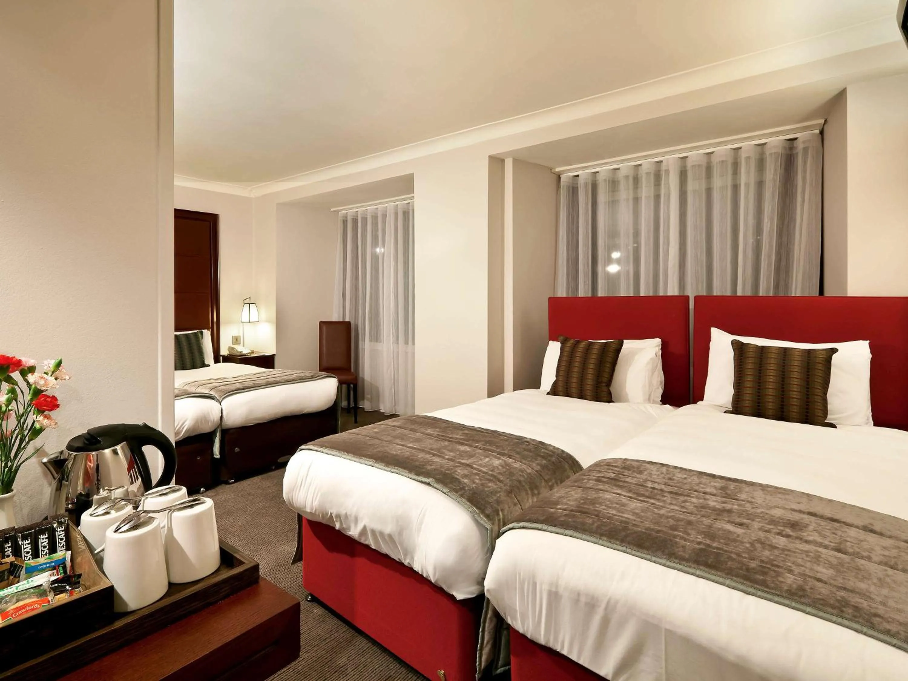 Photo of the whole room in Mercure London Kensington Hotel