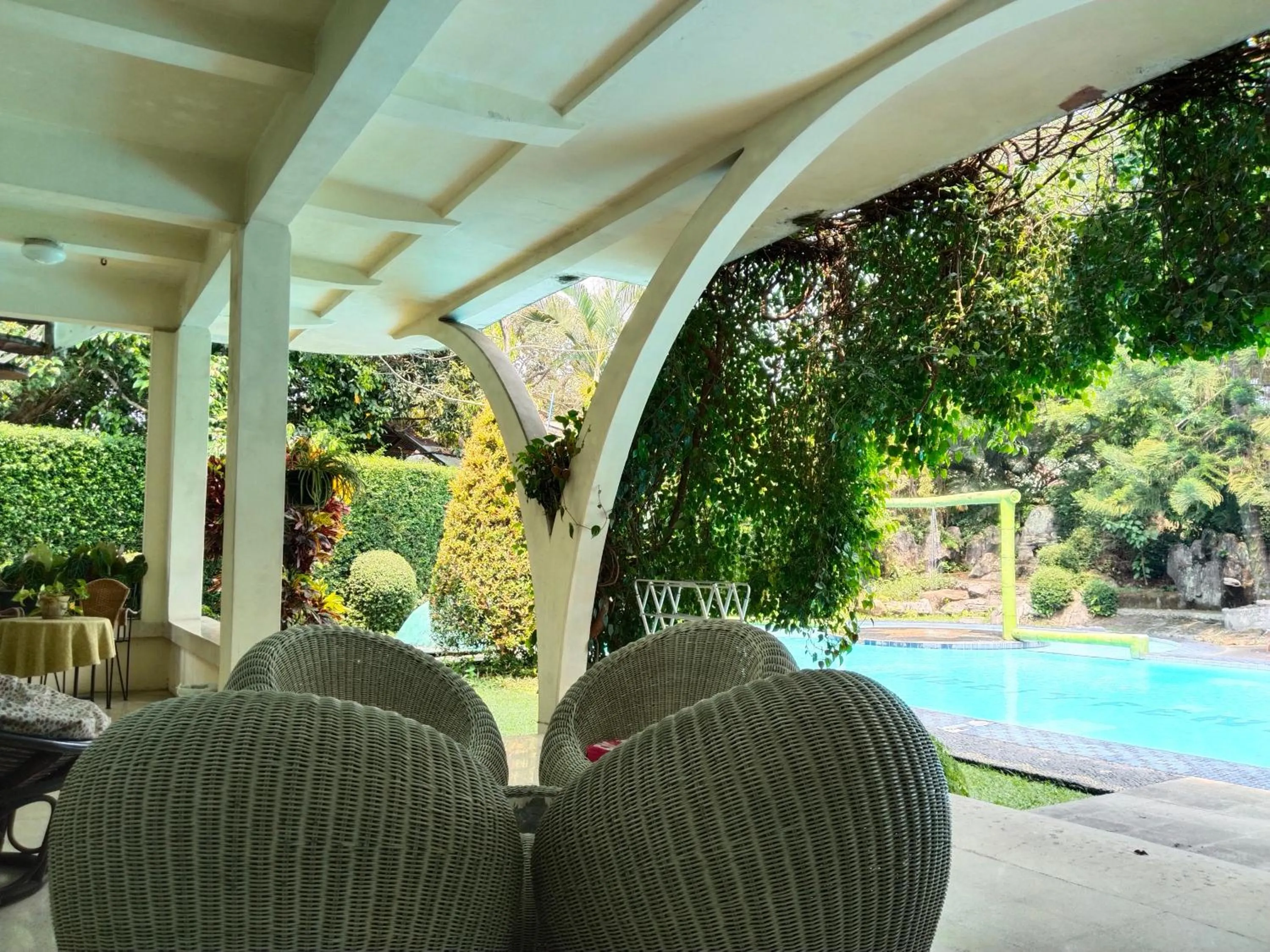 Seating area in The Garden Family Guest House powered by Cocotel