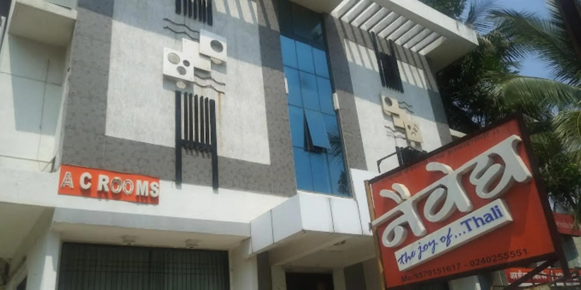 Property building, Property Logo/Sign in Hotel Naivedya