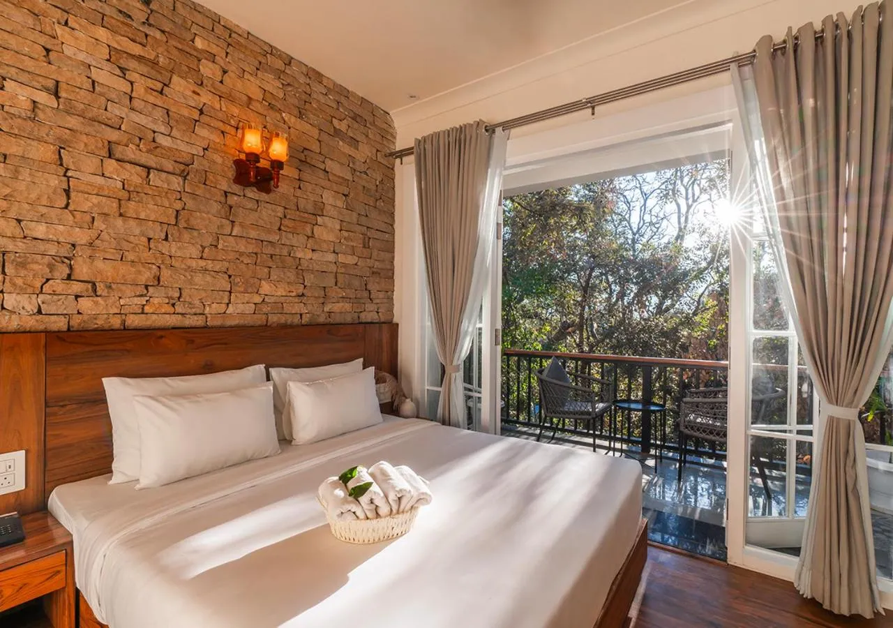 Bed in Moustache Bhimtal Luxuria, Nainital