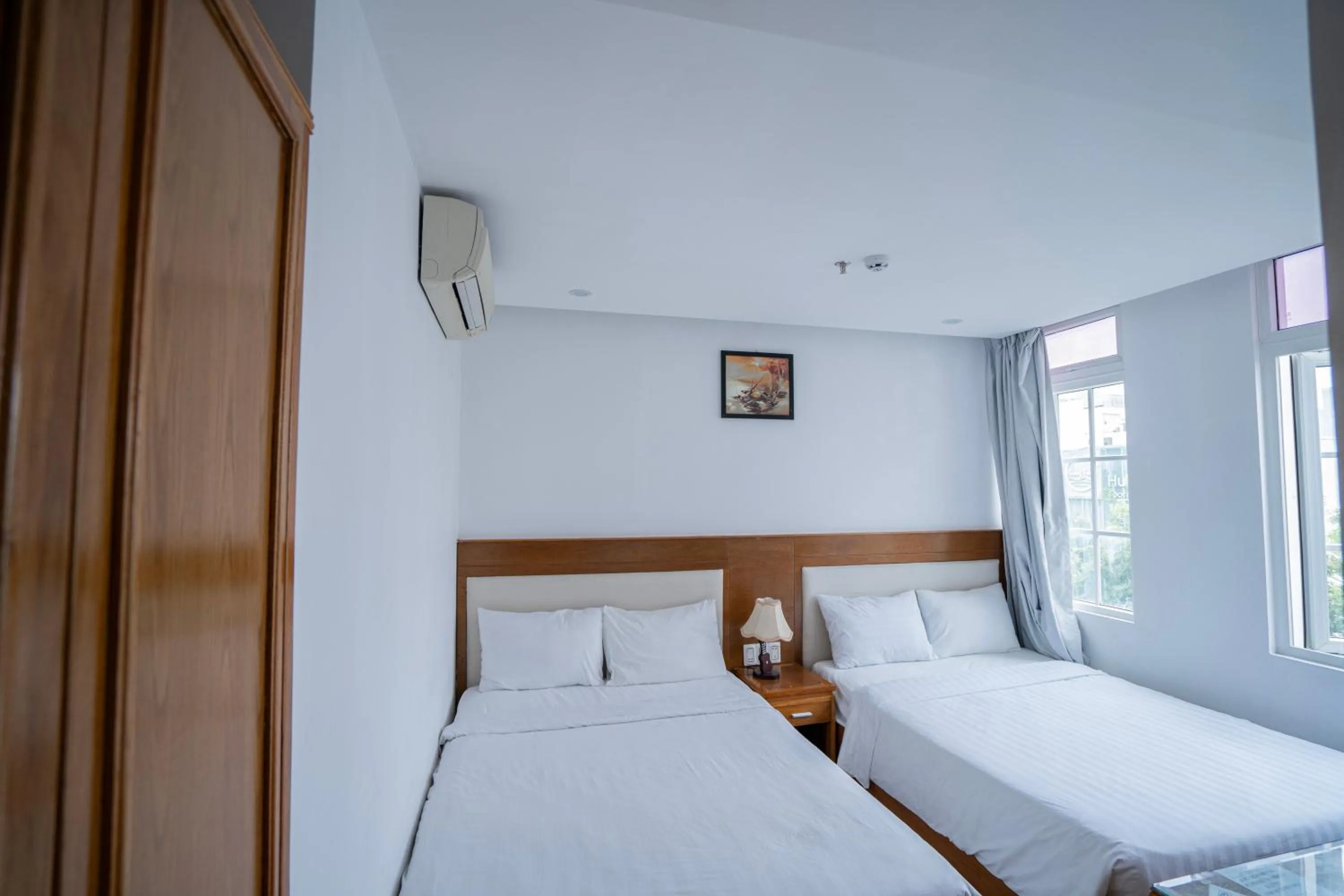 Bed in Sea Castle Hotel