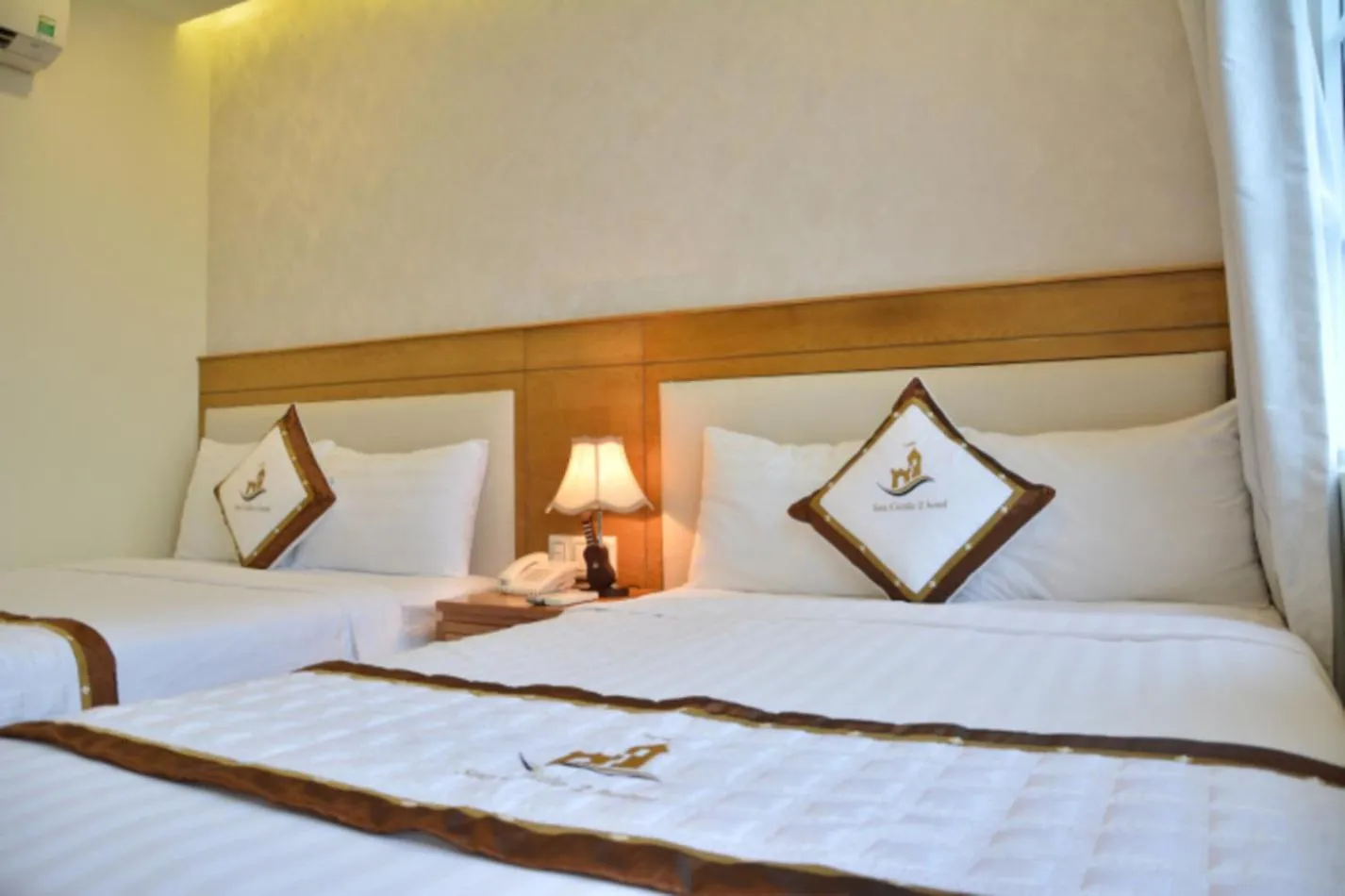 Bed in Sea Castle Hotel