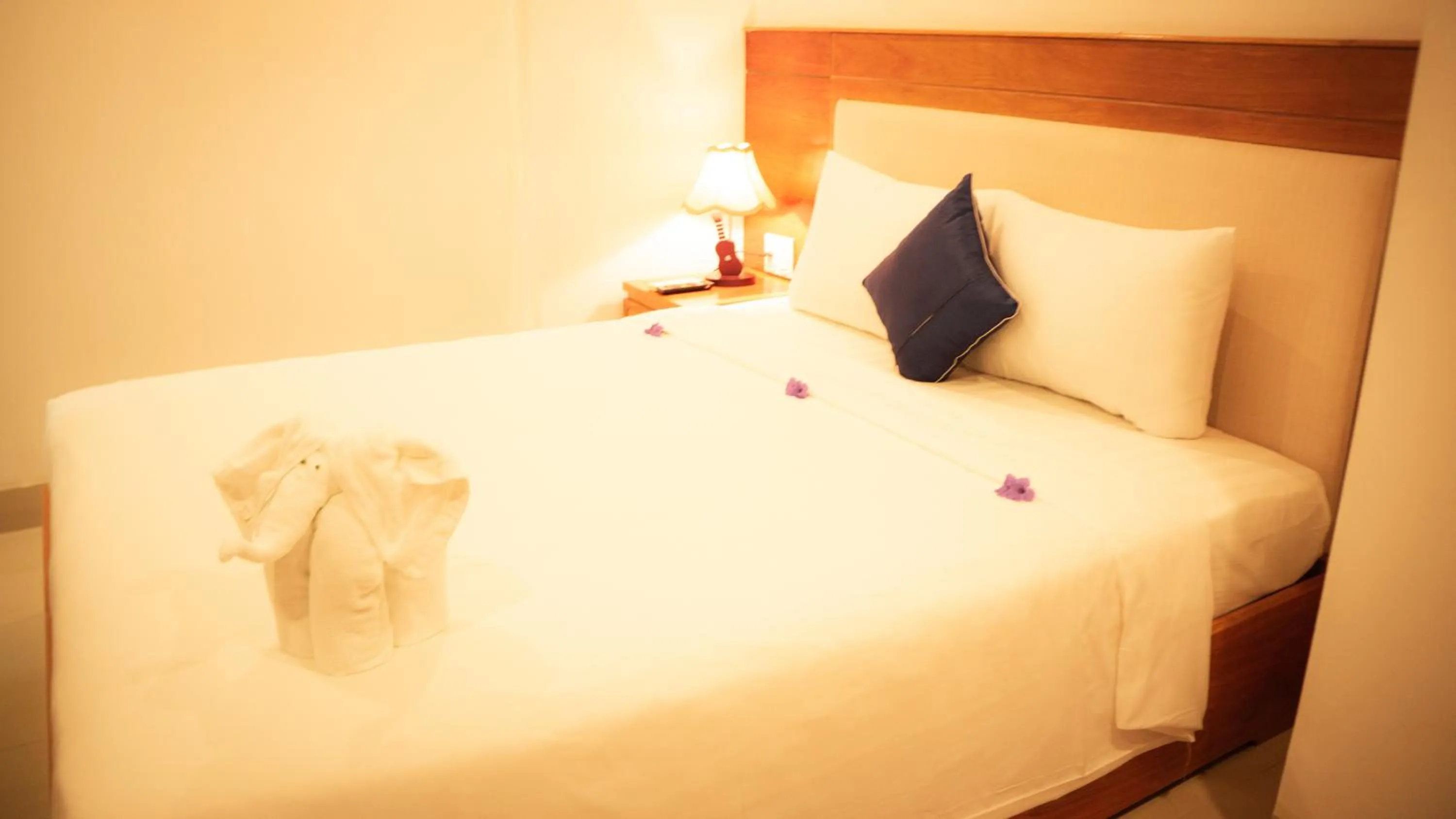 Bed in Sea Castle Hotel