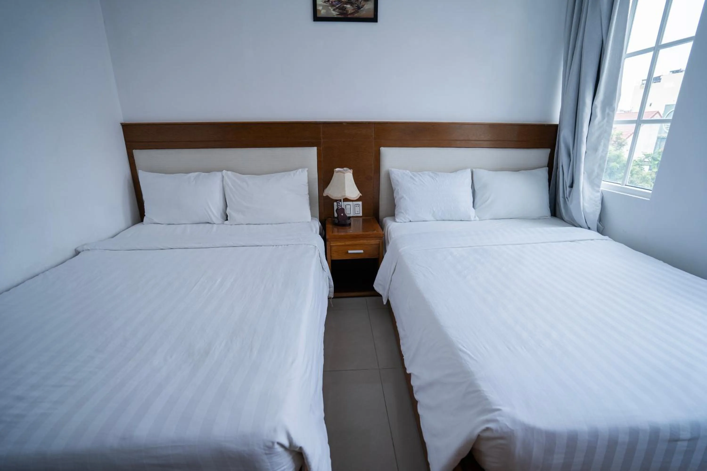 Bed in Sea Castle Hotel