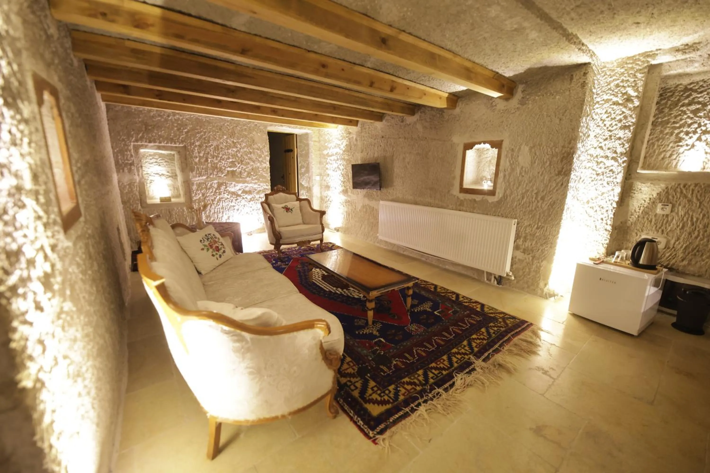 Living room in My Cave Suites