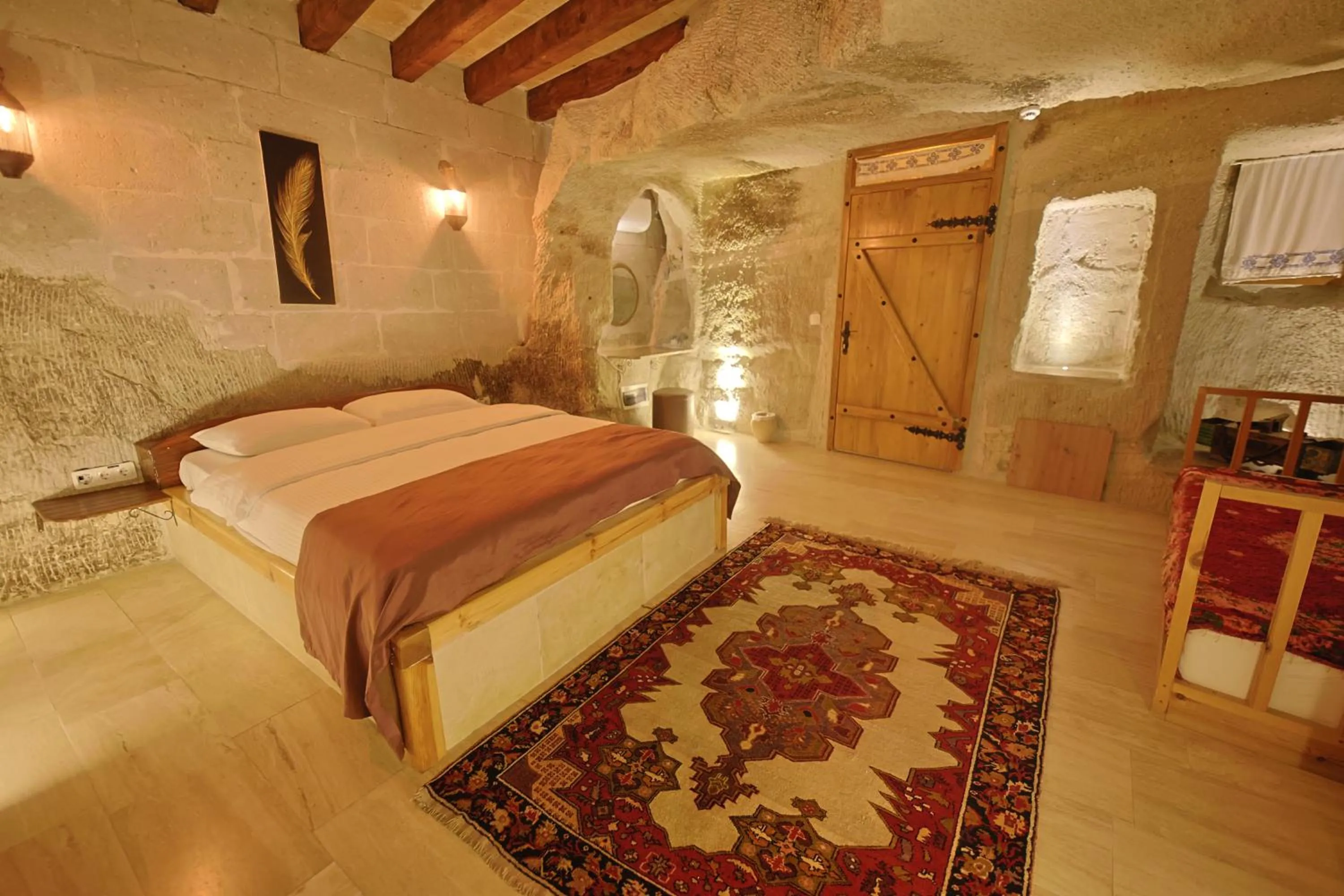 Bedroom, Bed in My Cave Suites