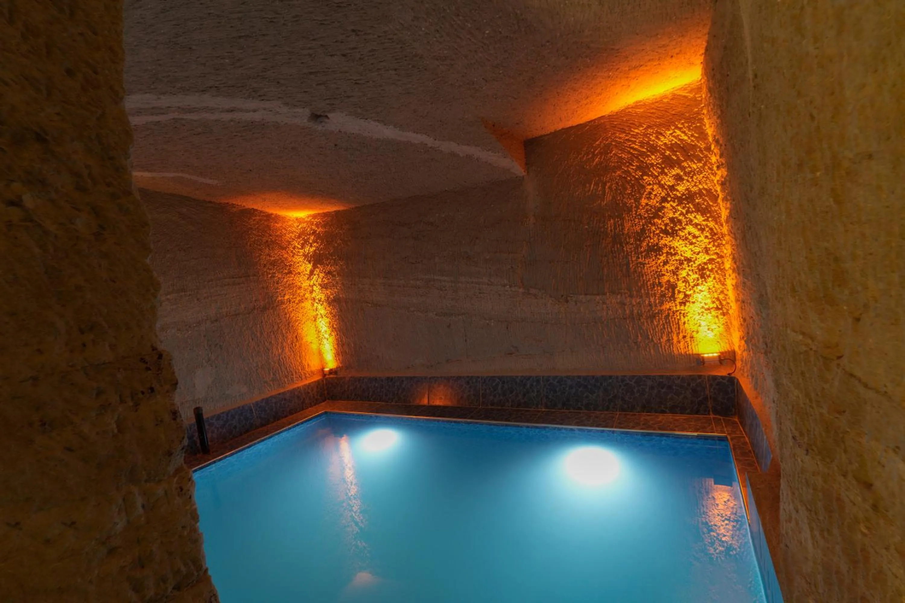 Swimming pool in My Cave Suites