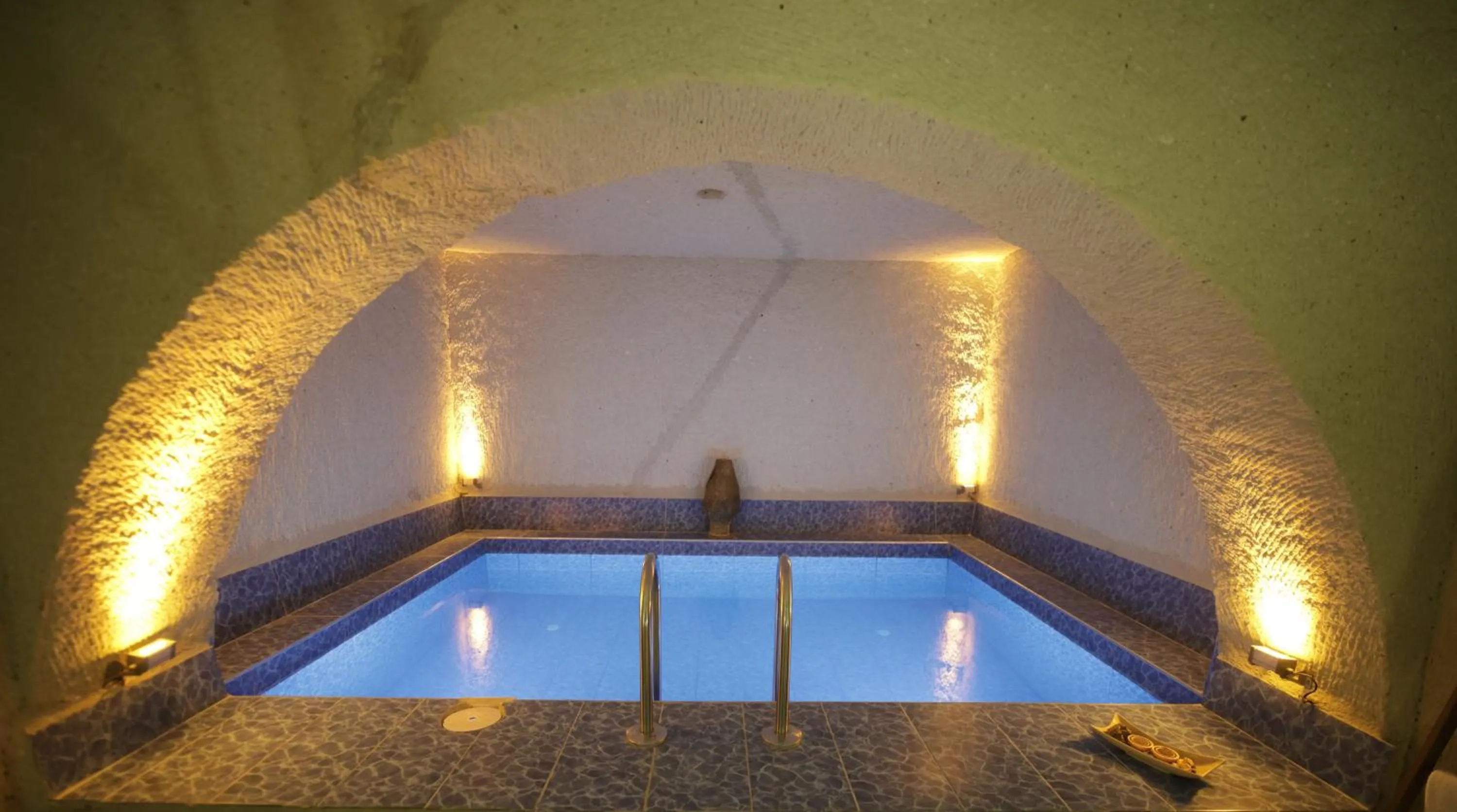 Swimming pool in My Cave Suites