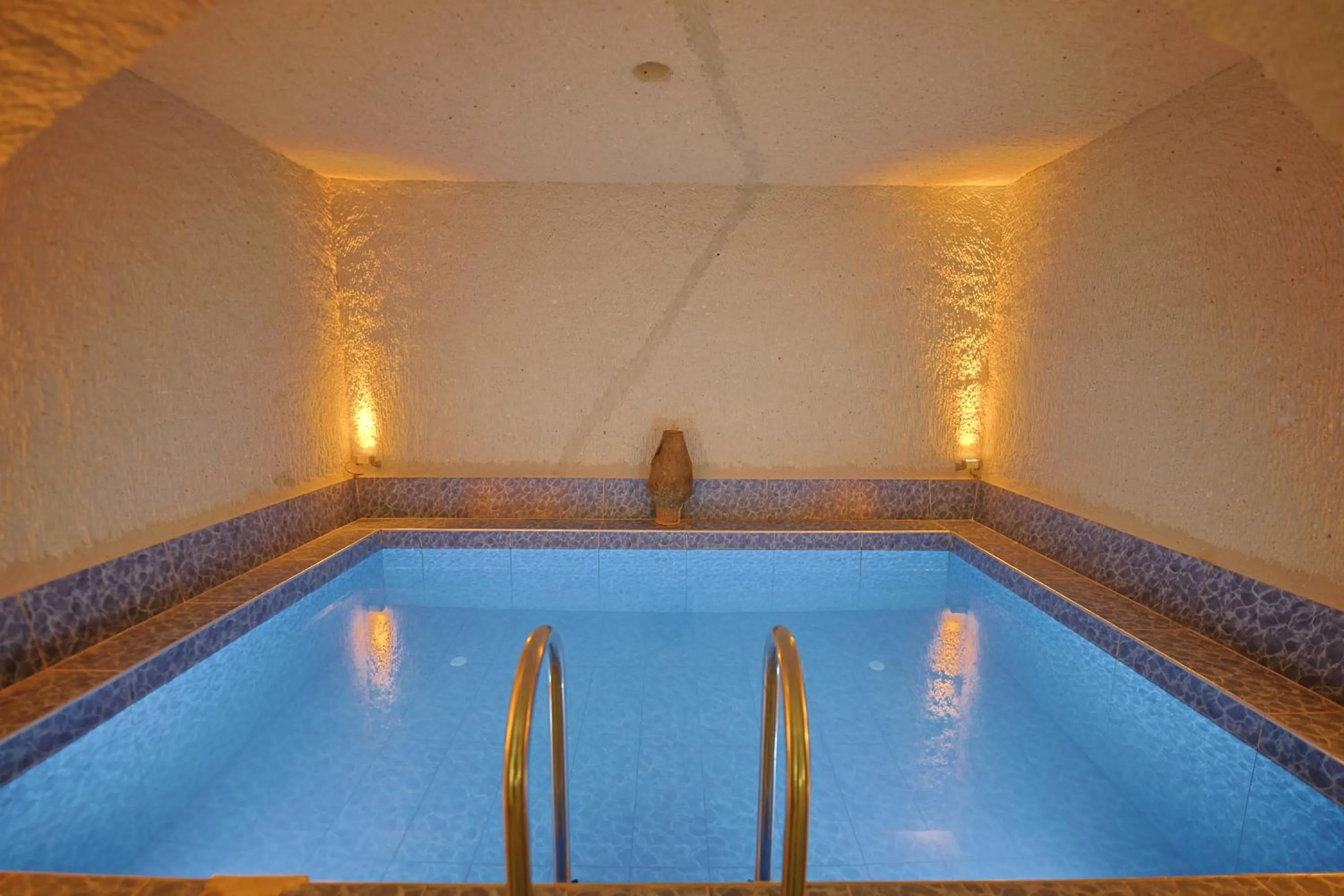 Swimming pool in My Cave Suites