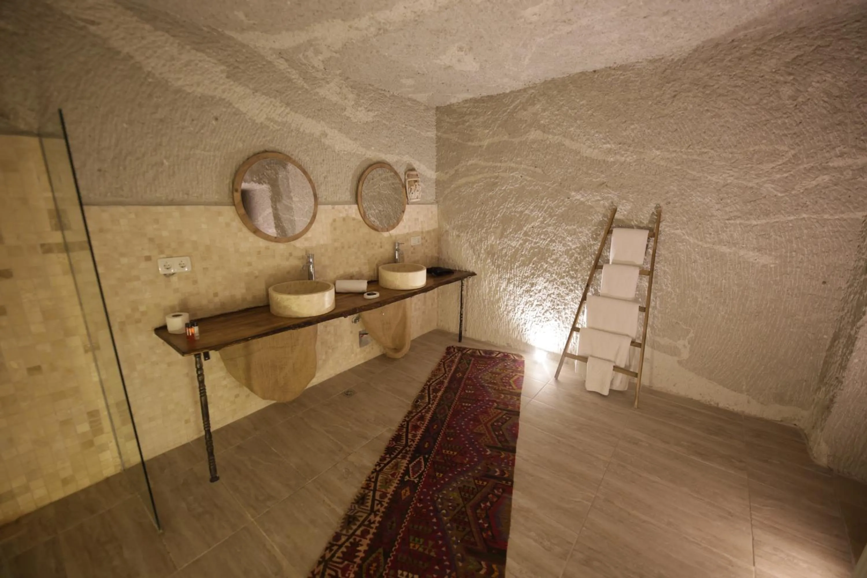 Bathroom in My Cave Suites