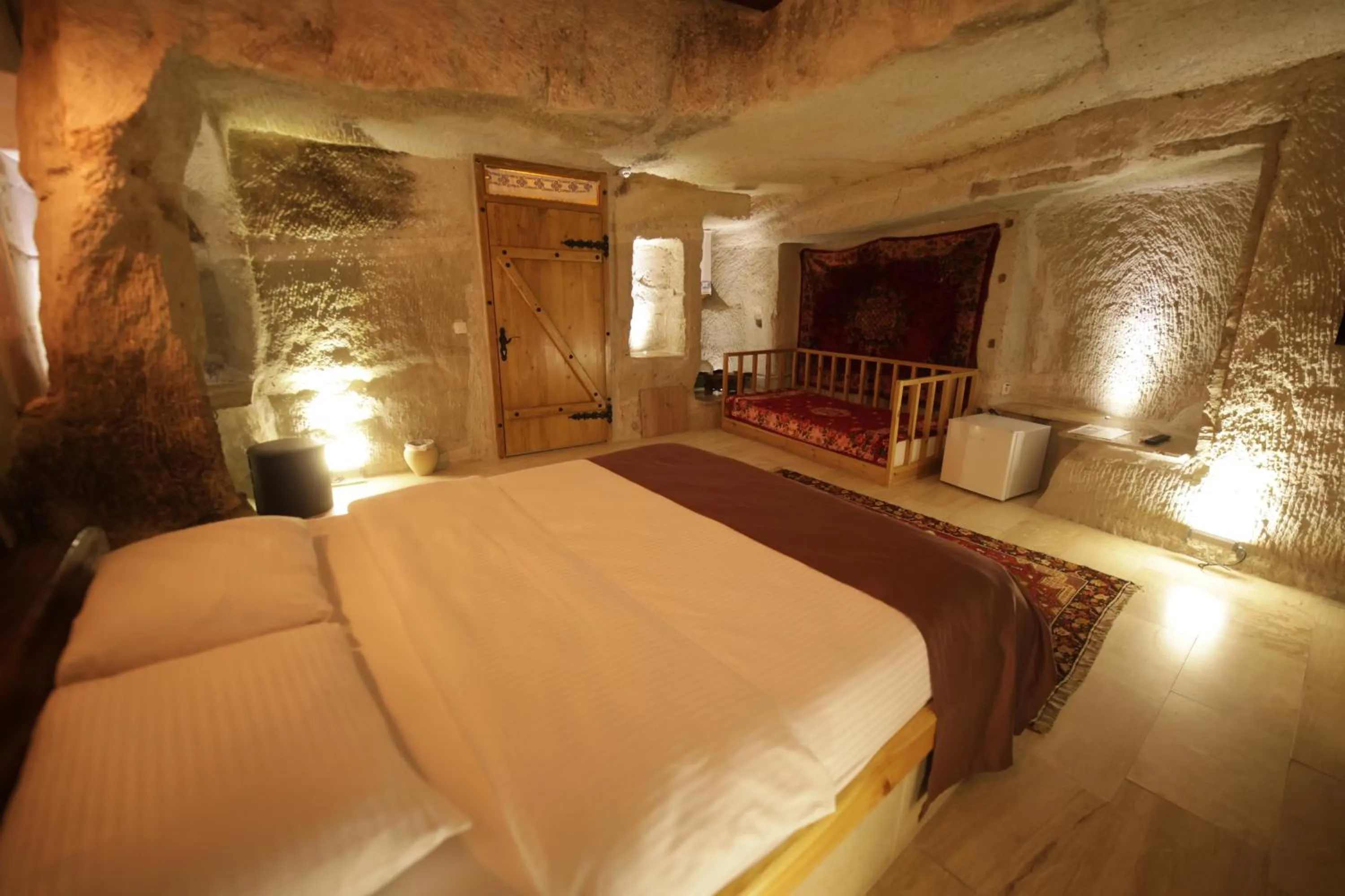 Facade/entrance, Bed in My Cave Suites