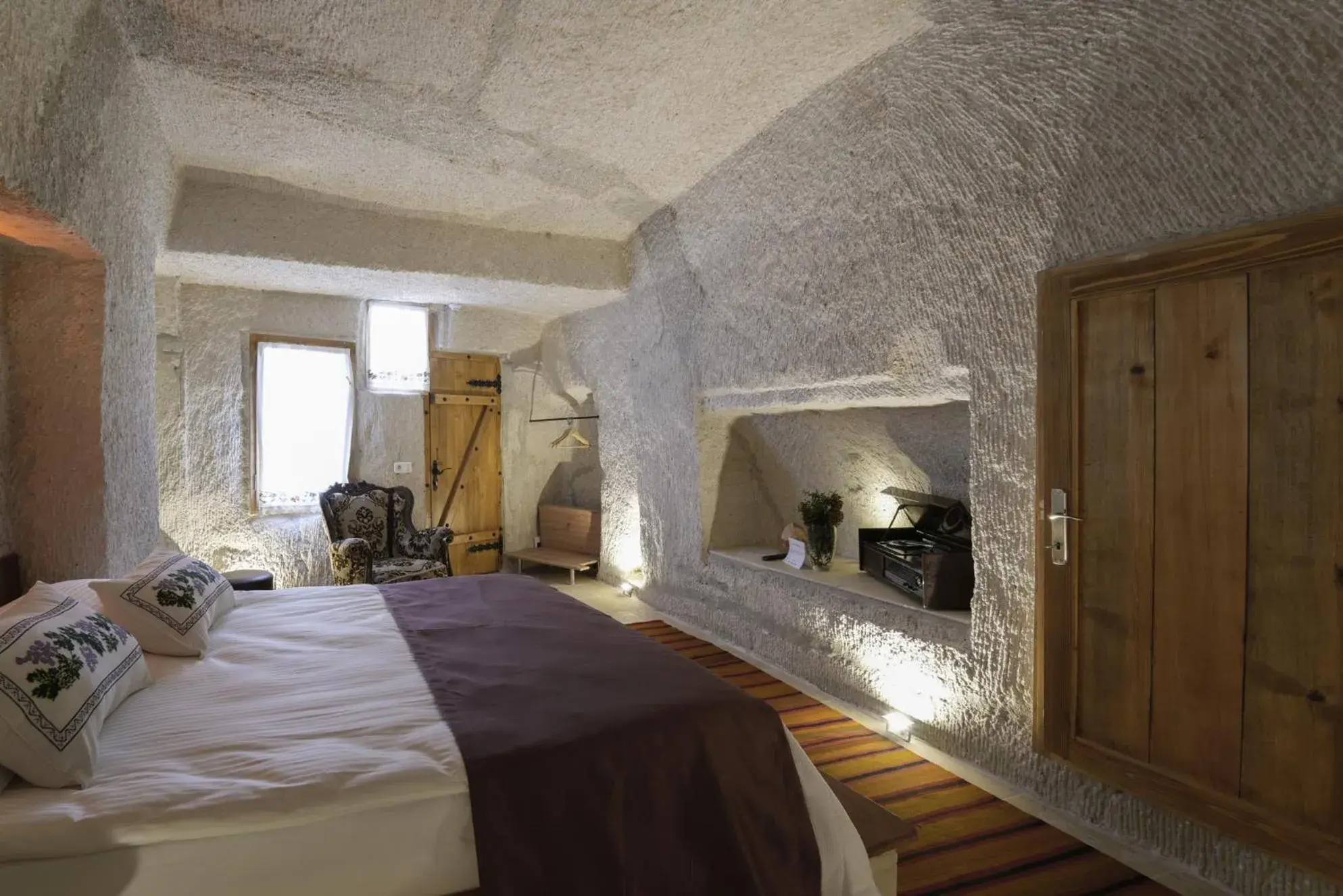 Seating area, Bed in My Cave Suites Seating area, Bed in My Cave Suites