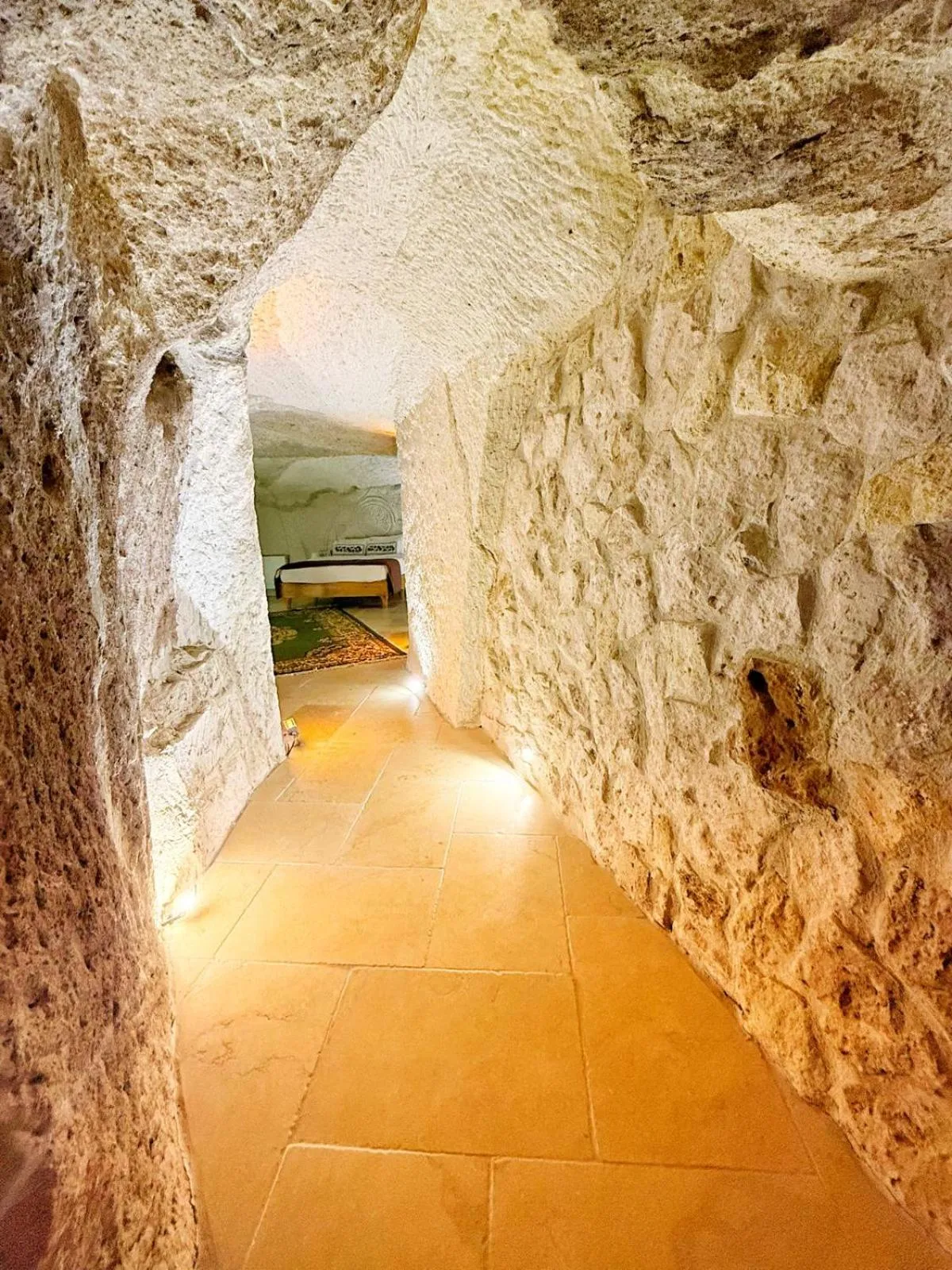 Bedroom in My Cave Suites