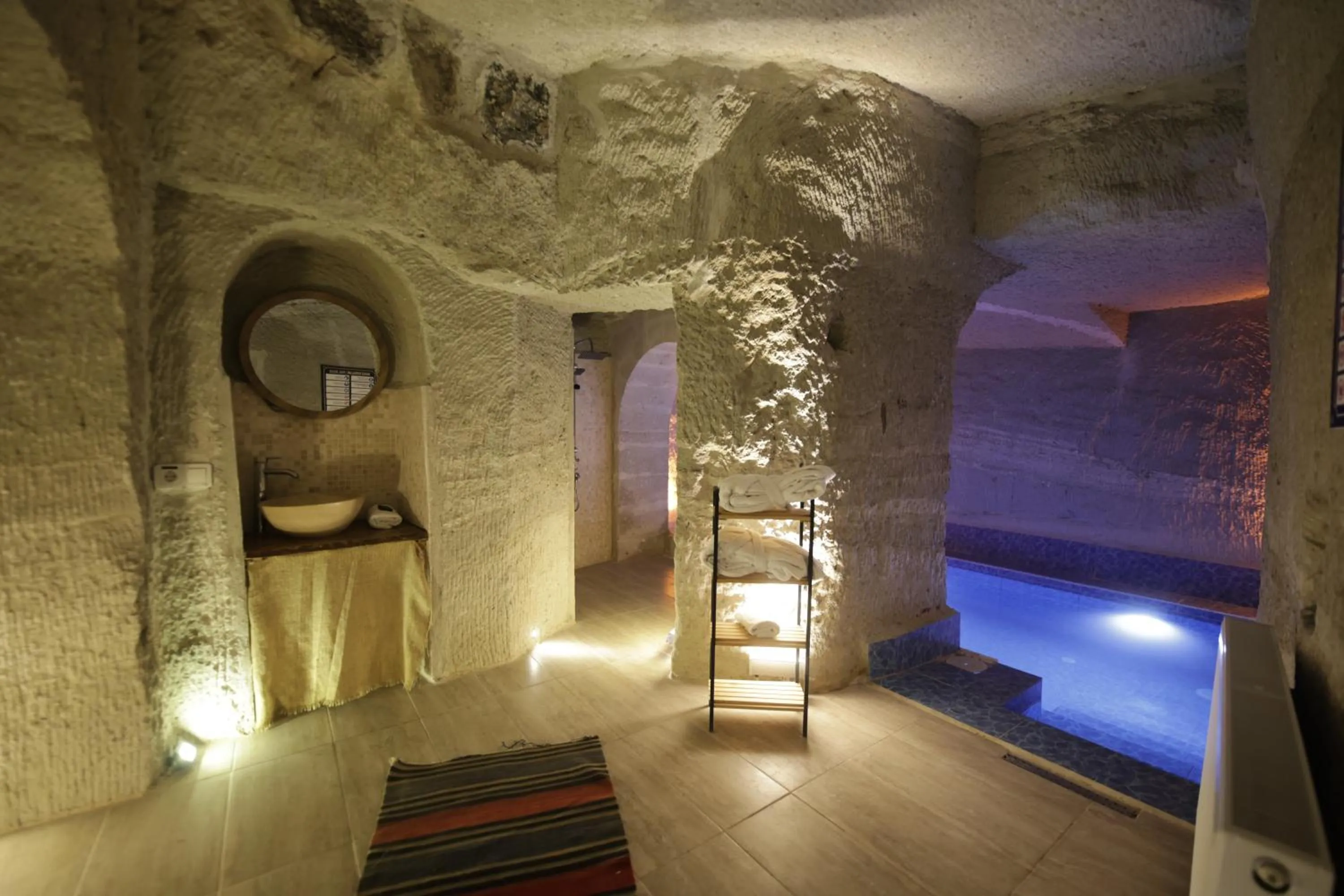 Swimming pool, Bed in My Cave Suites