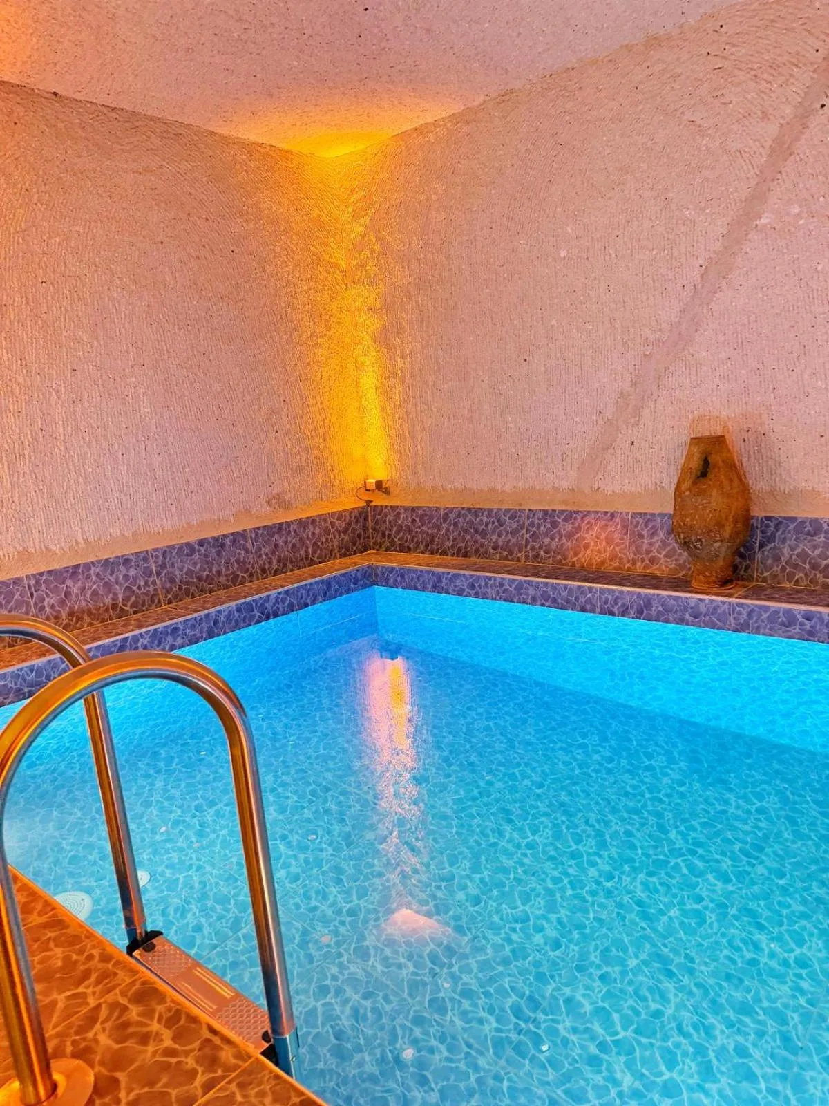 Swimming pool in My Cave Suites