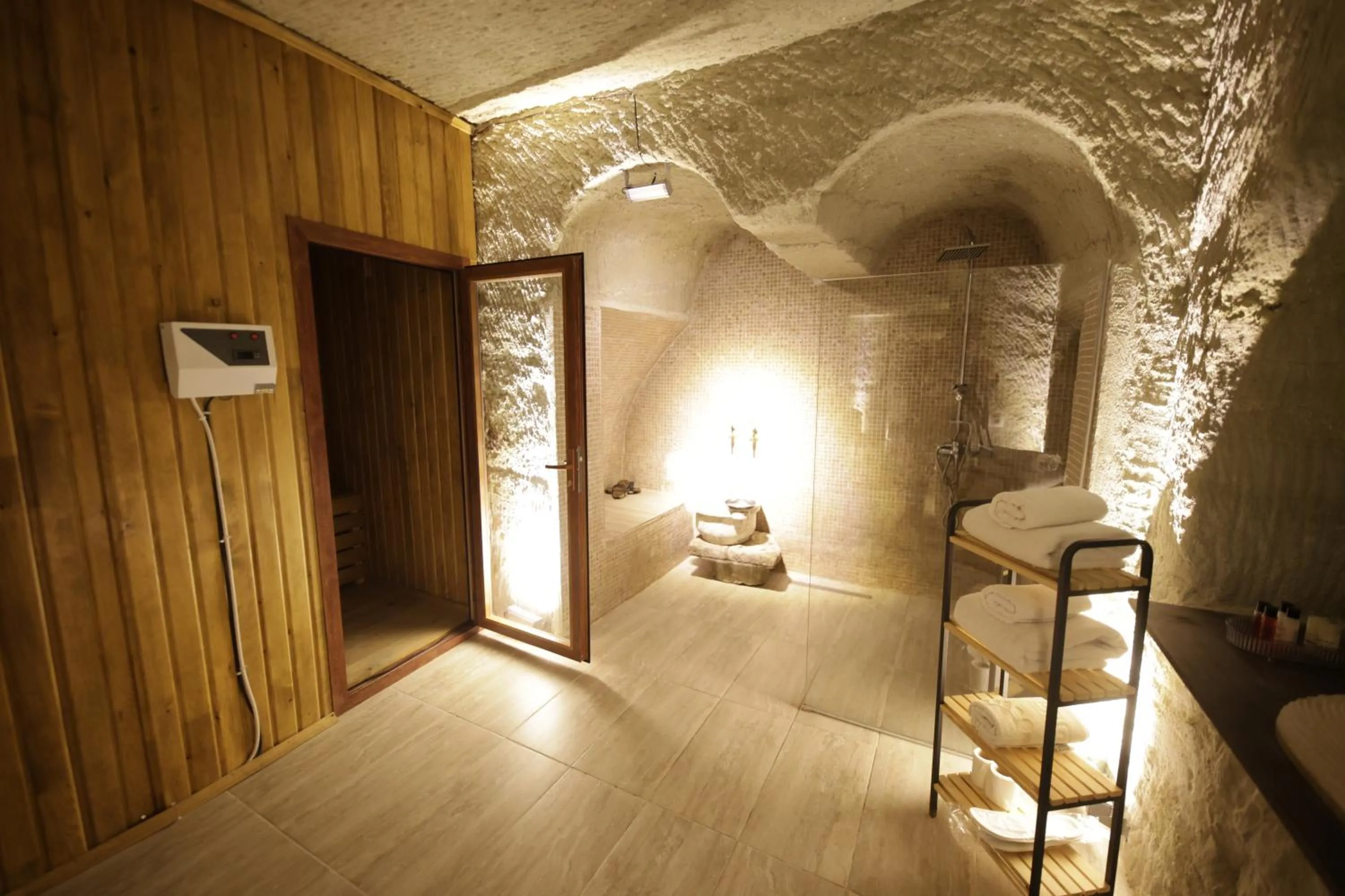 Bathroom, Bed in My Cave Suites