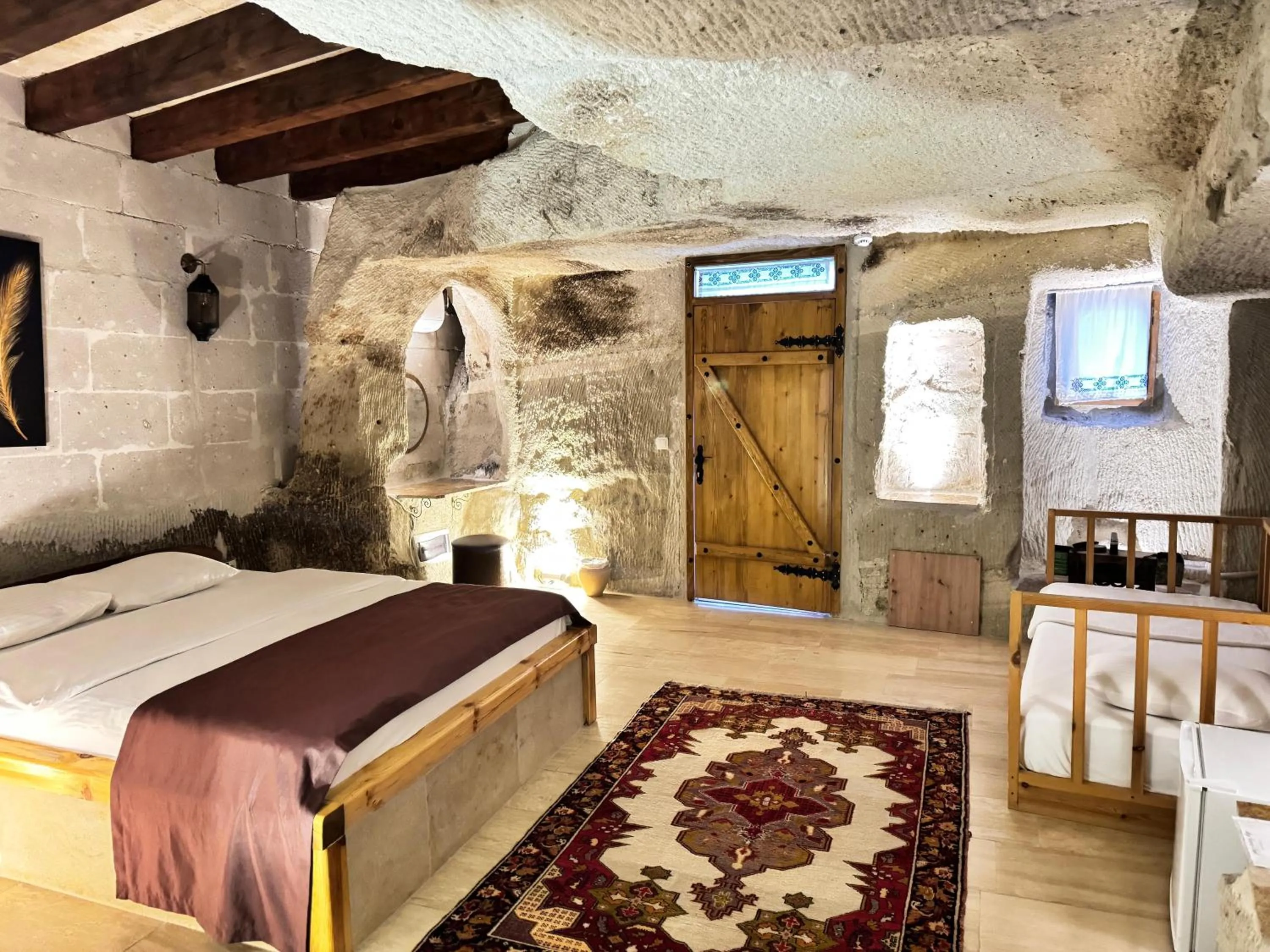 Bedroom, Bed in My Cave Suites