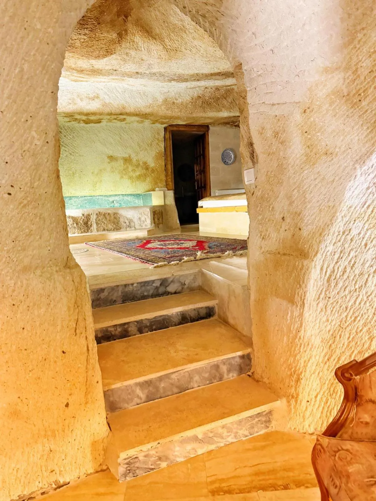 Bedroom in My Cave Suites