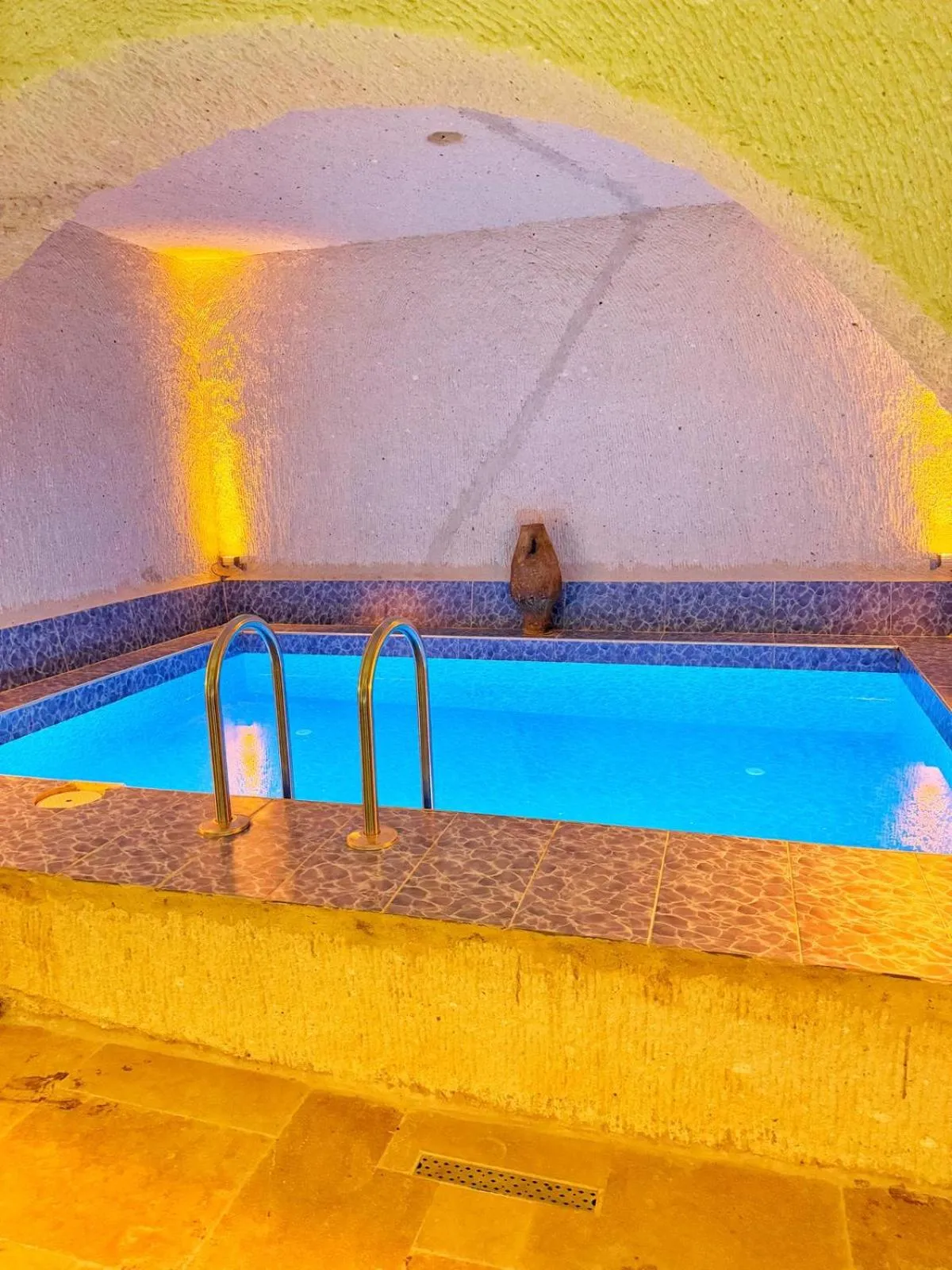 Swimming pool in My Cave Suites