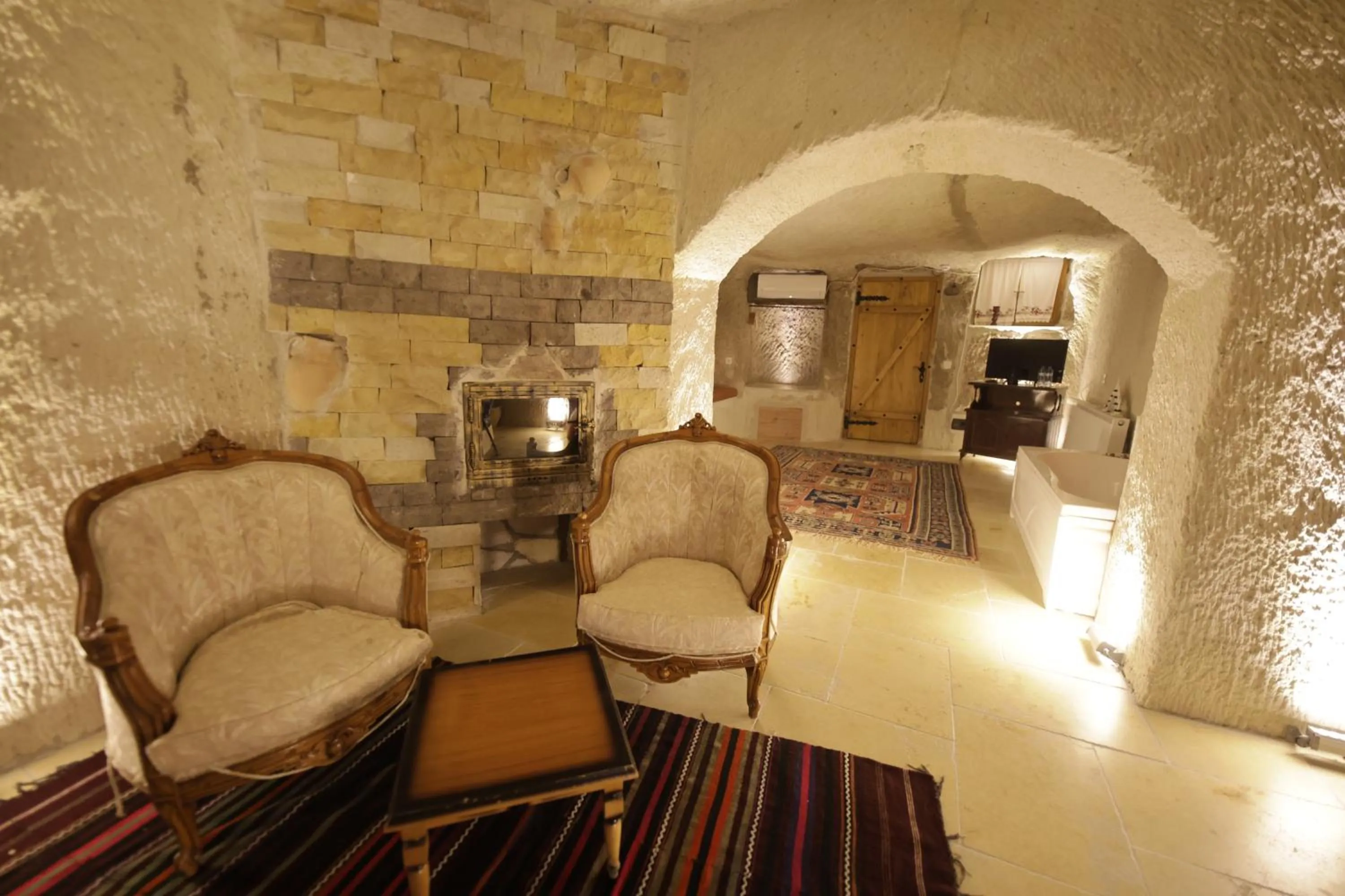 fireplace in My Cave Suites