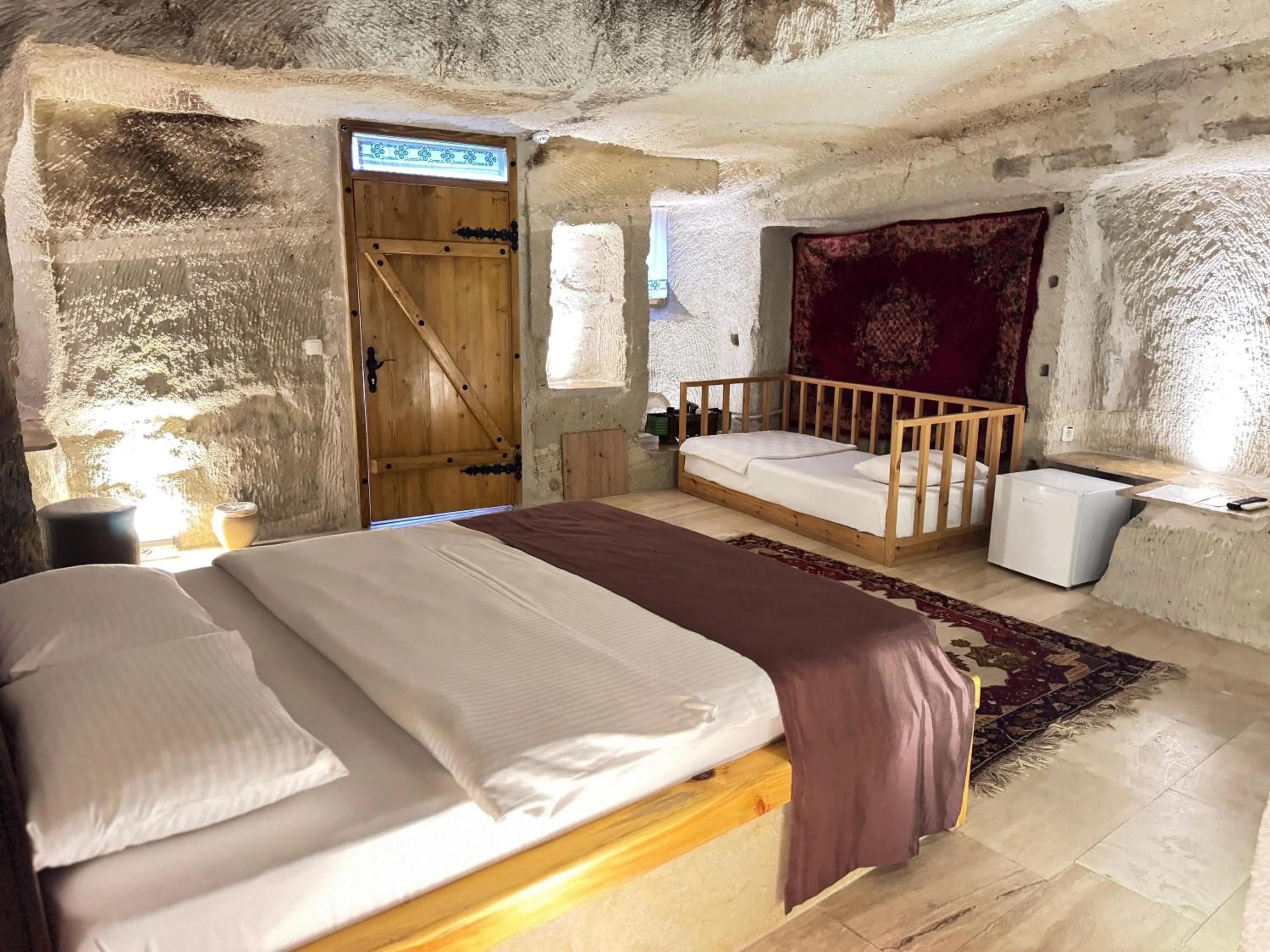 Bedroom, Bed in My Cave Suites